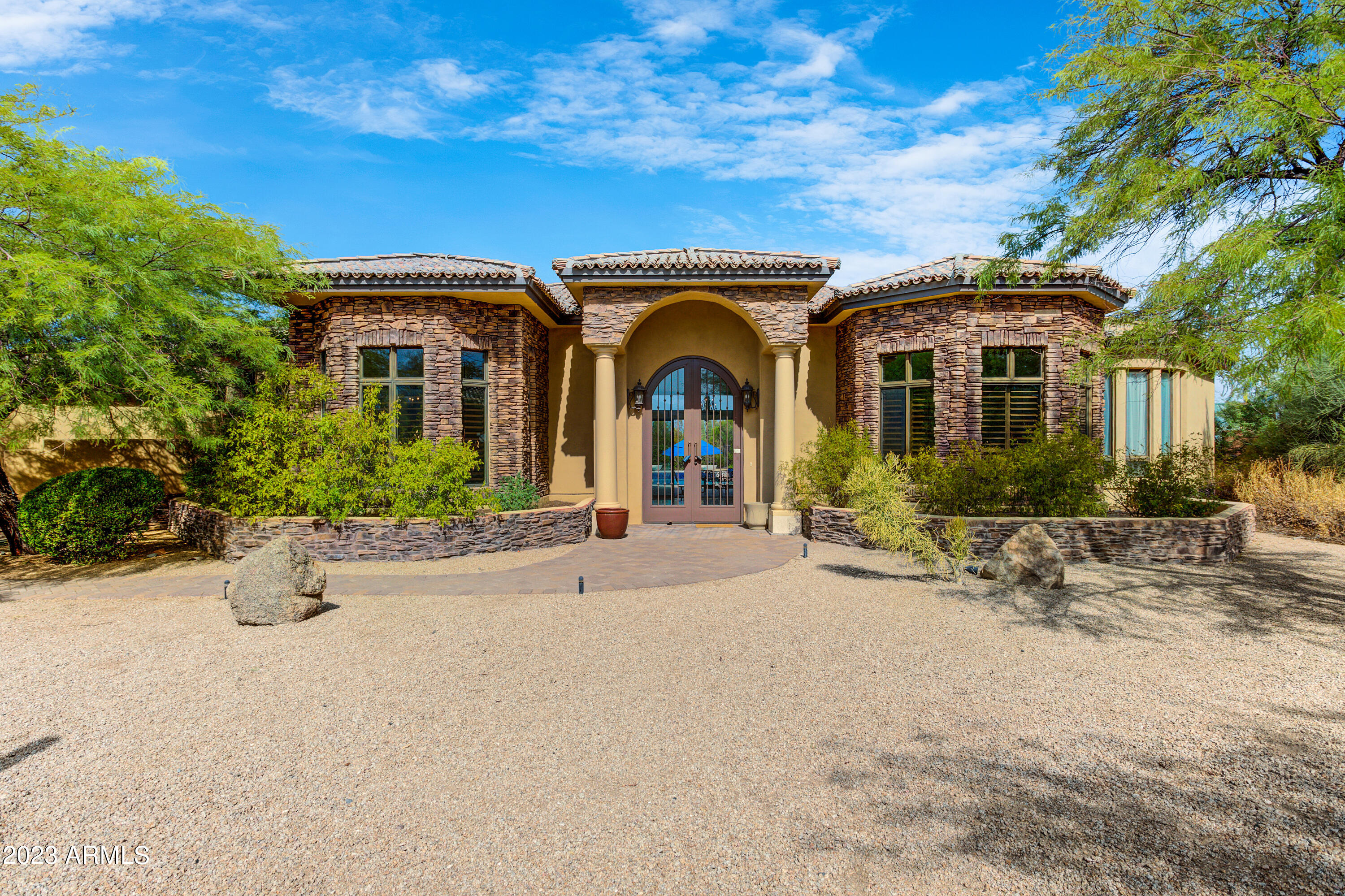 8008 E WHISTLING WIND Way
