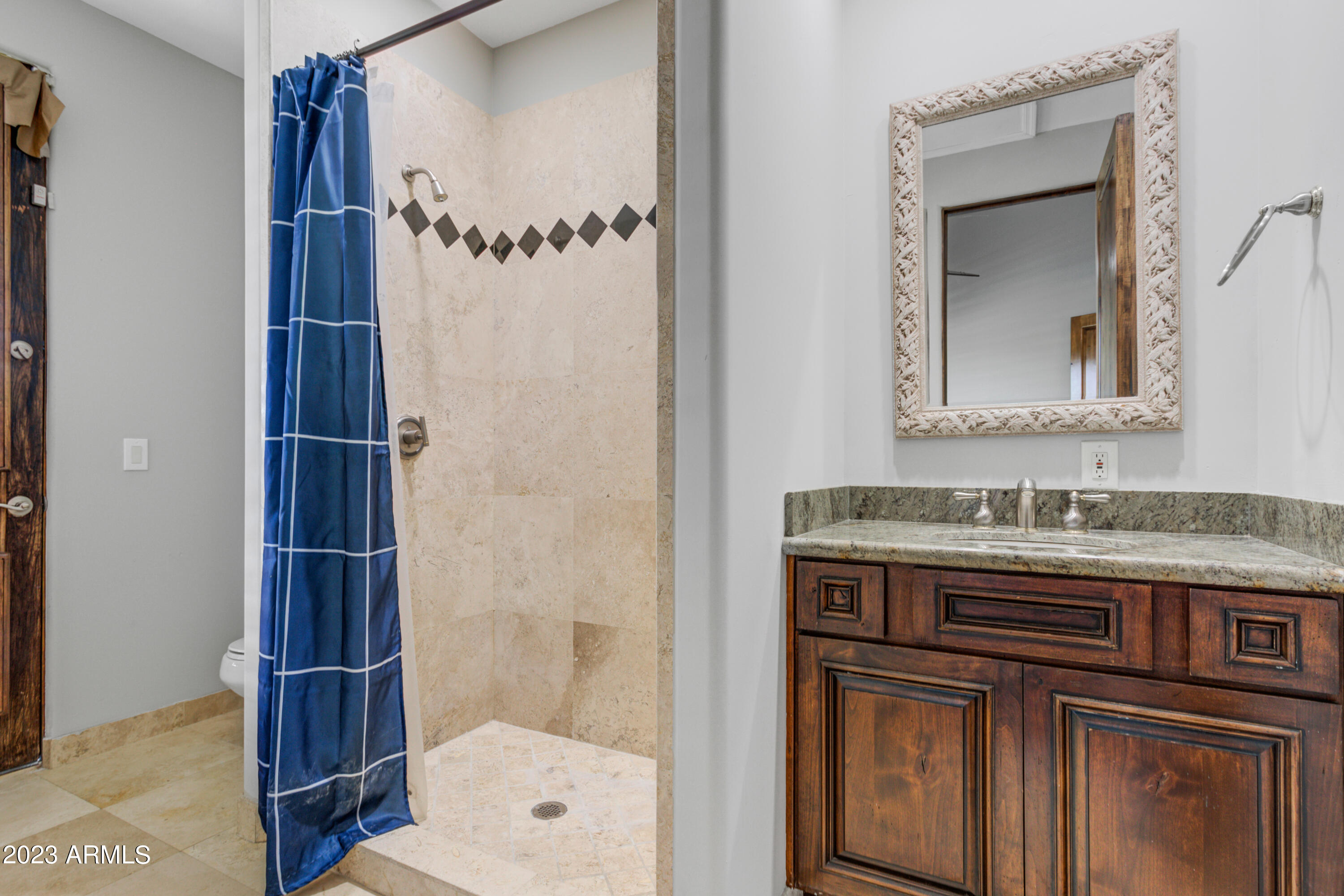 8008 E WHISTLING WIND Way