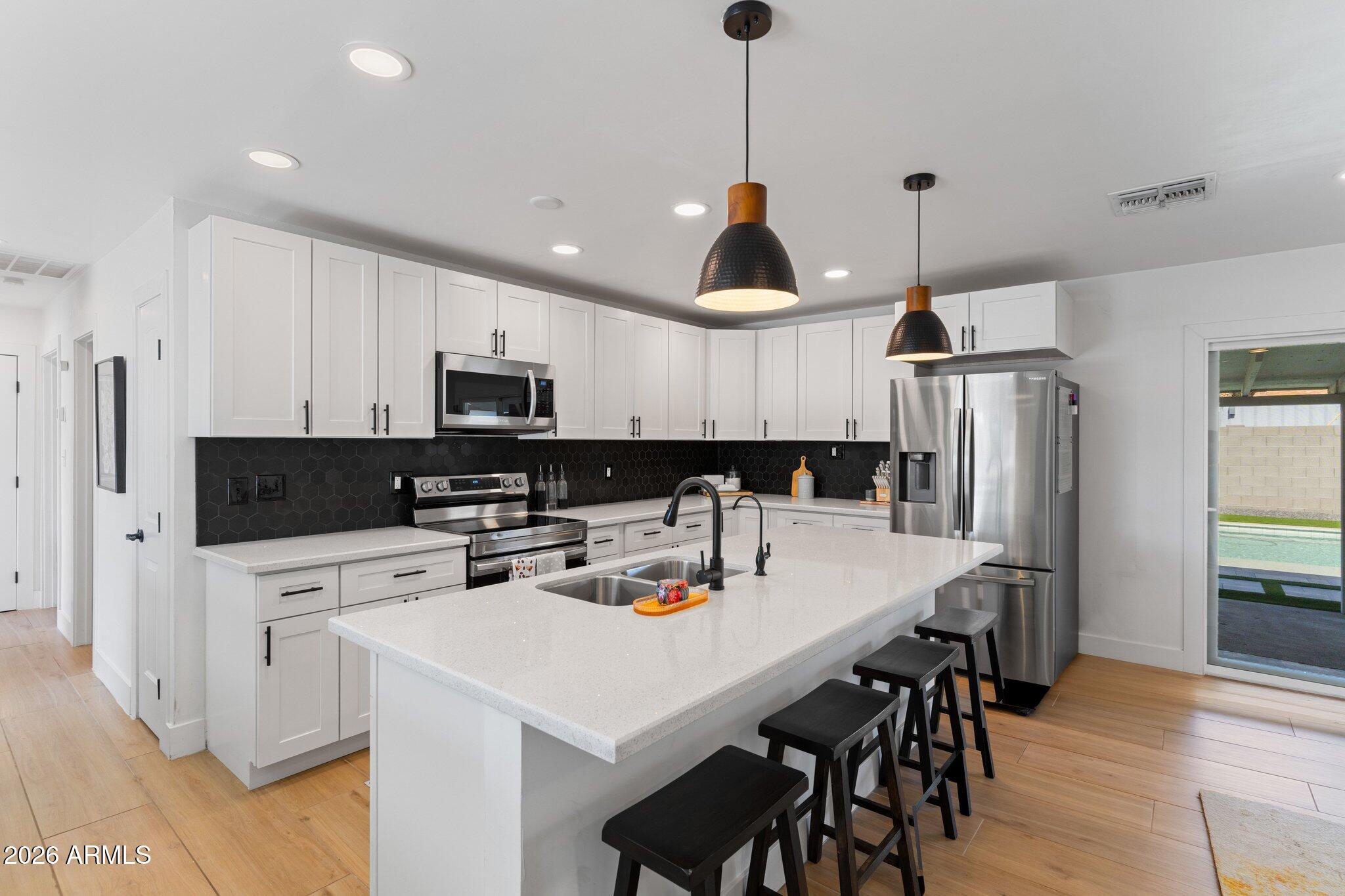 8602 E ROANOKE Avenue