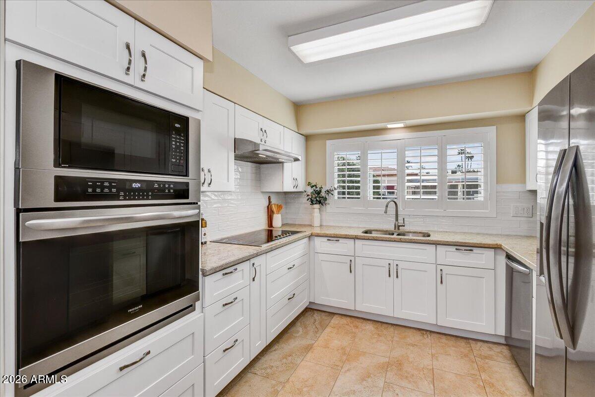 7706 E MEADOWBROOK Avenue