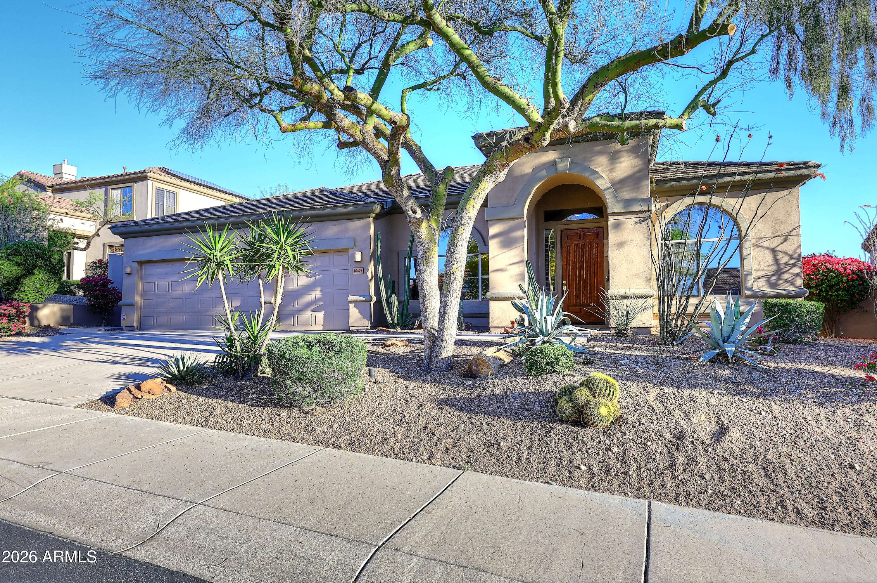 10679 E RAINTREE Drive