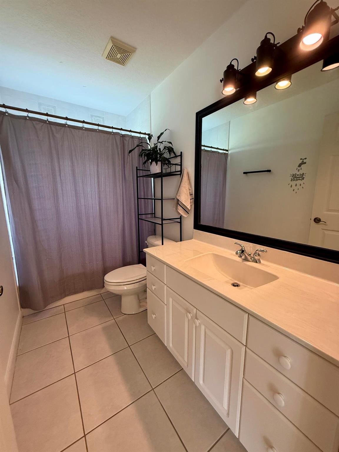 1043 SW Pigeon Plum Way
