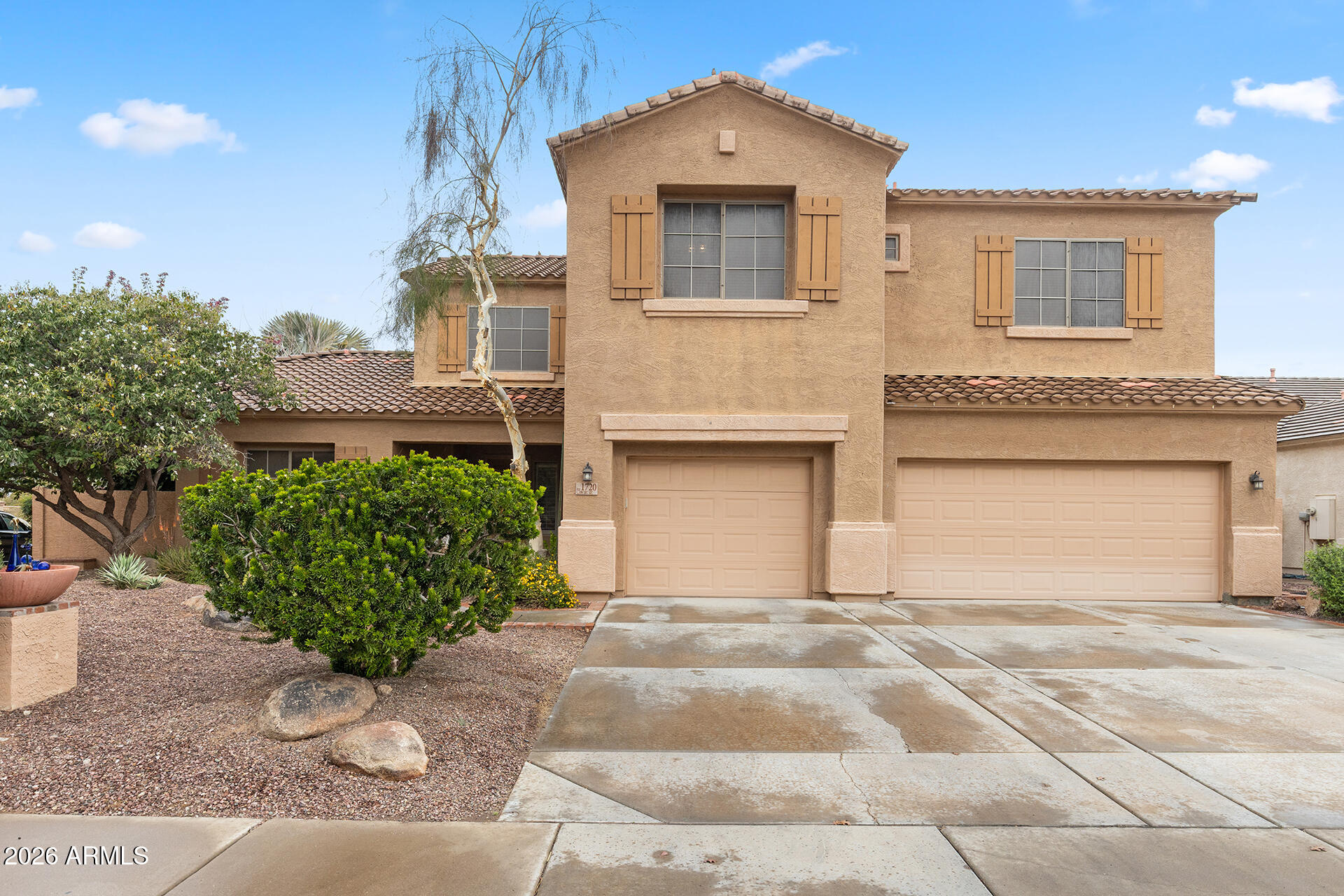 1720 E WOODSMAN Place