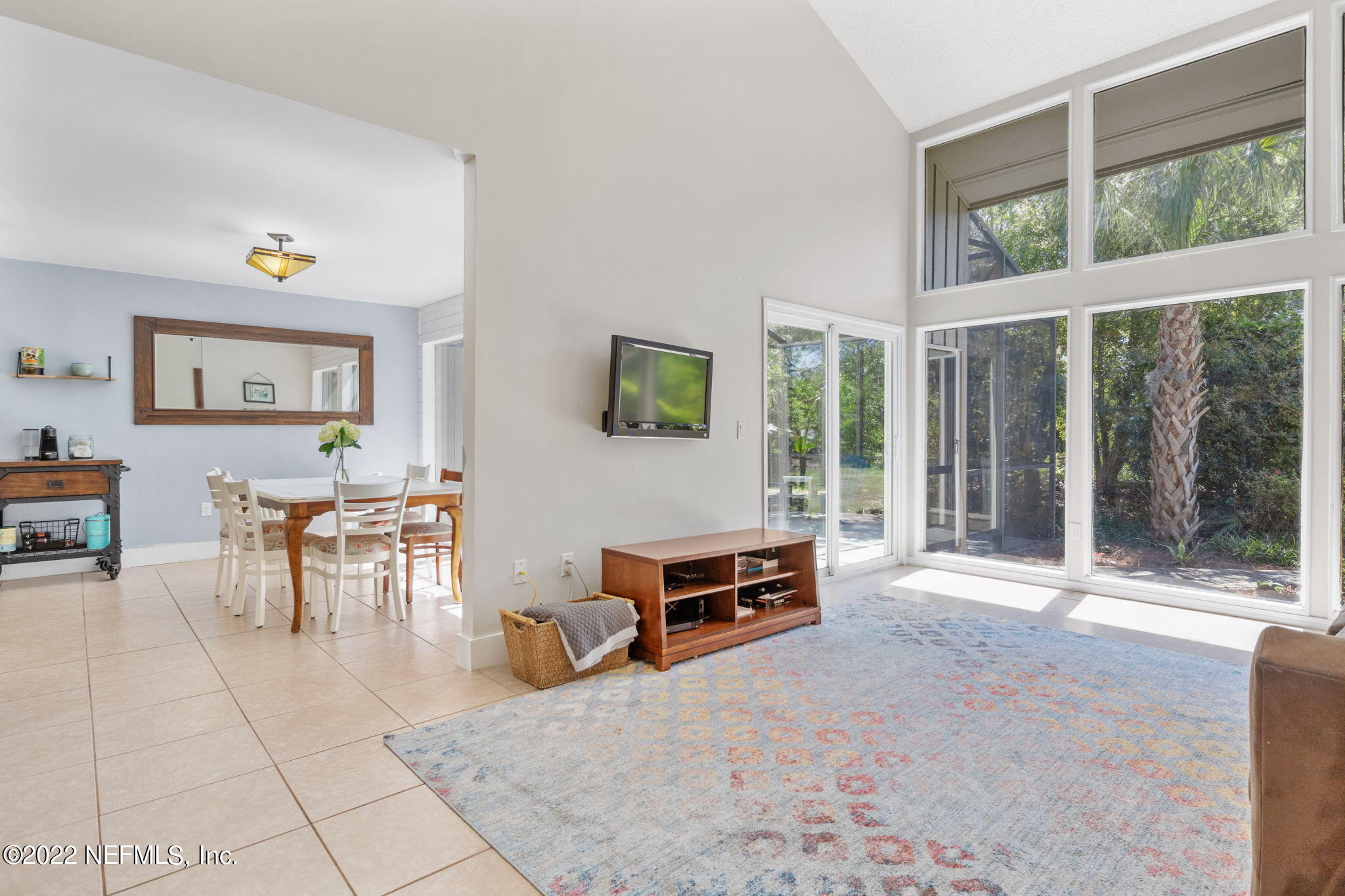 9893 SAWGRASS DR E