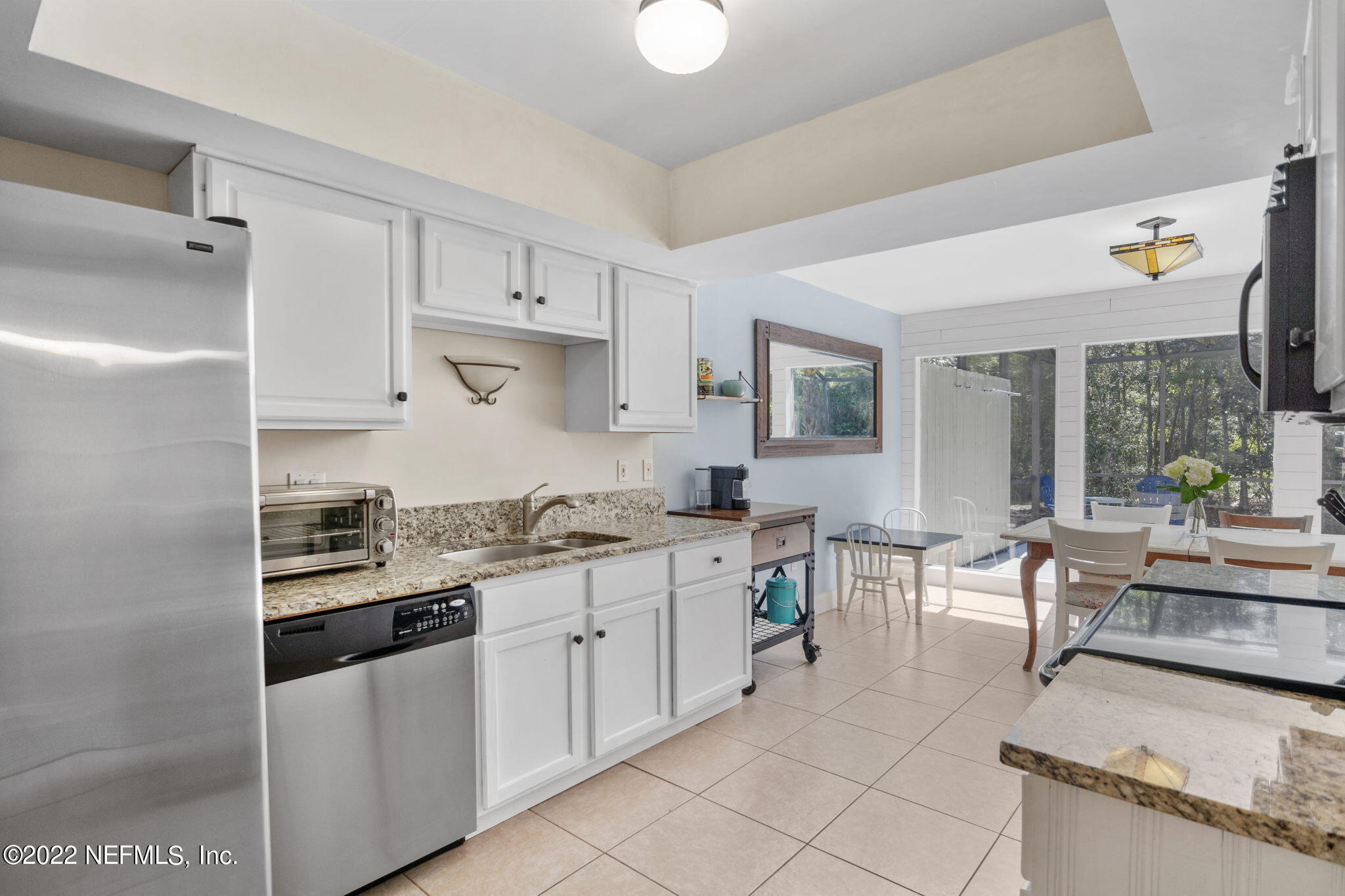 9893 SAWGRASS DR E