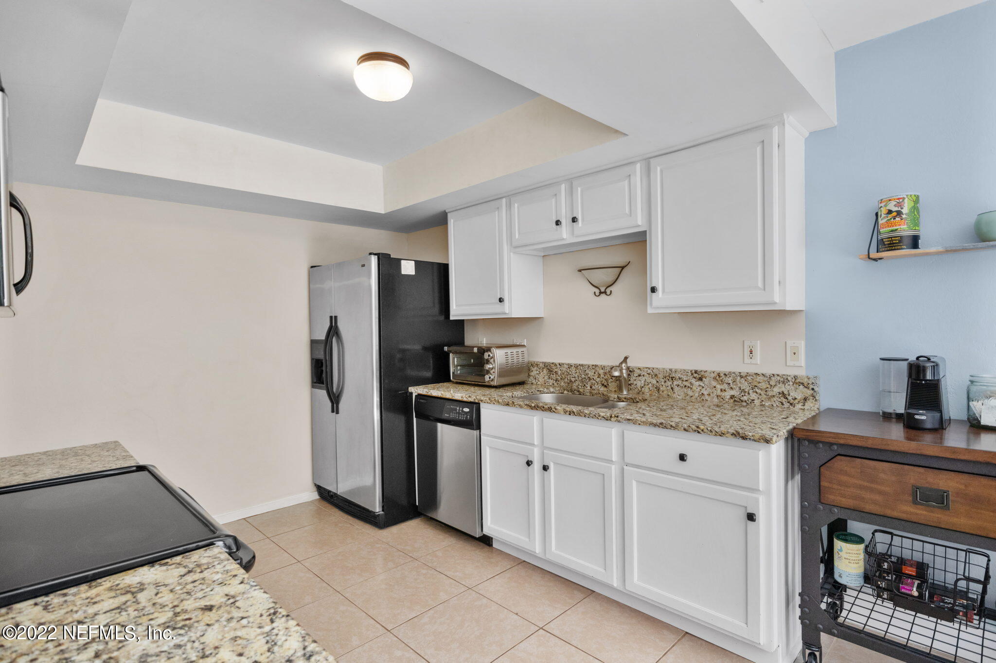 9893 SAWGRASS DR E
