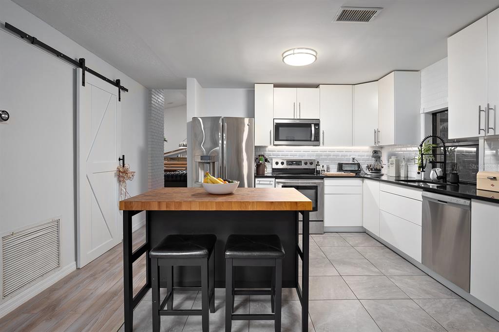 7308 PINEMOUNT DRIVE