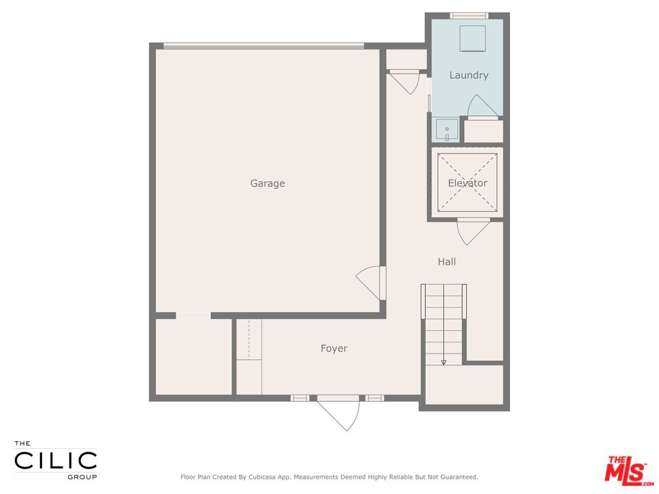 Floor plan showing a garage, foyer, hall, laundry room, elevator, and staircase.