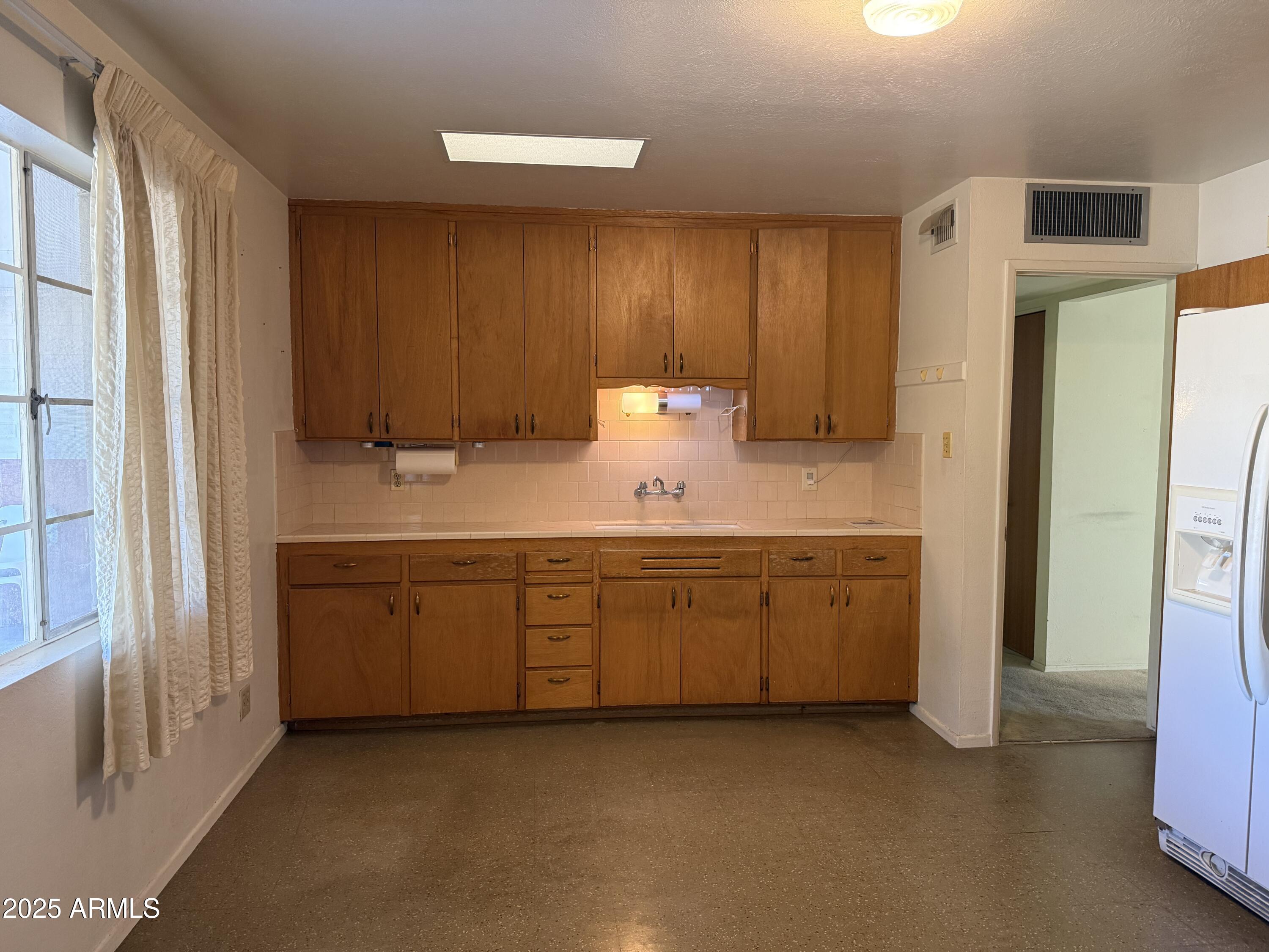 7038 E BELLEVIEW Street