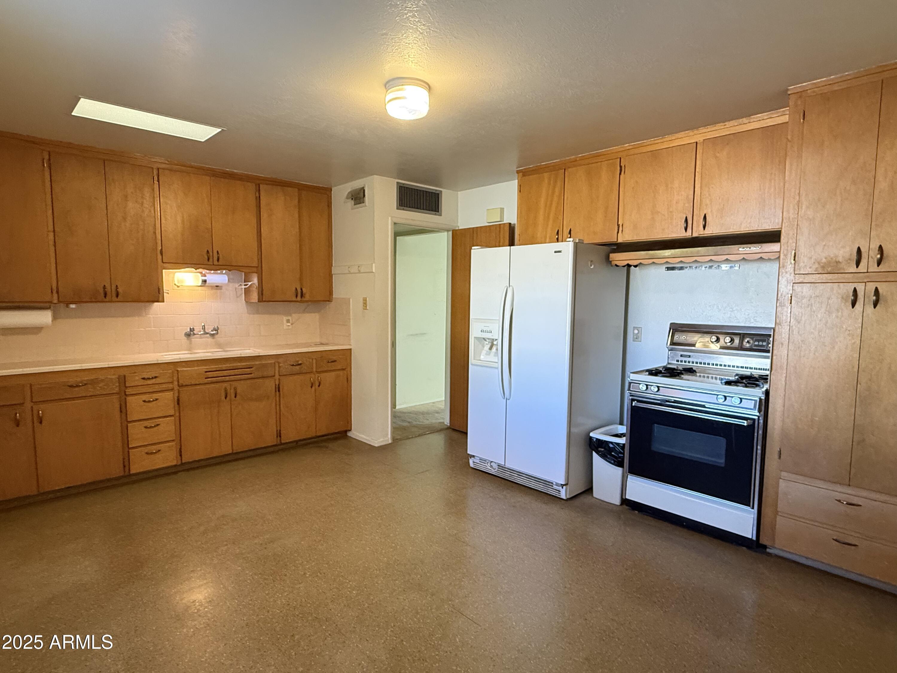 7038 E BELLEVIEW Street