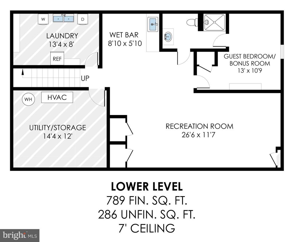 Lower-level floor plan with recreation room, guest bedroom, wet bar, laundry, and utility storage.