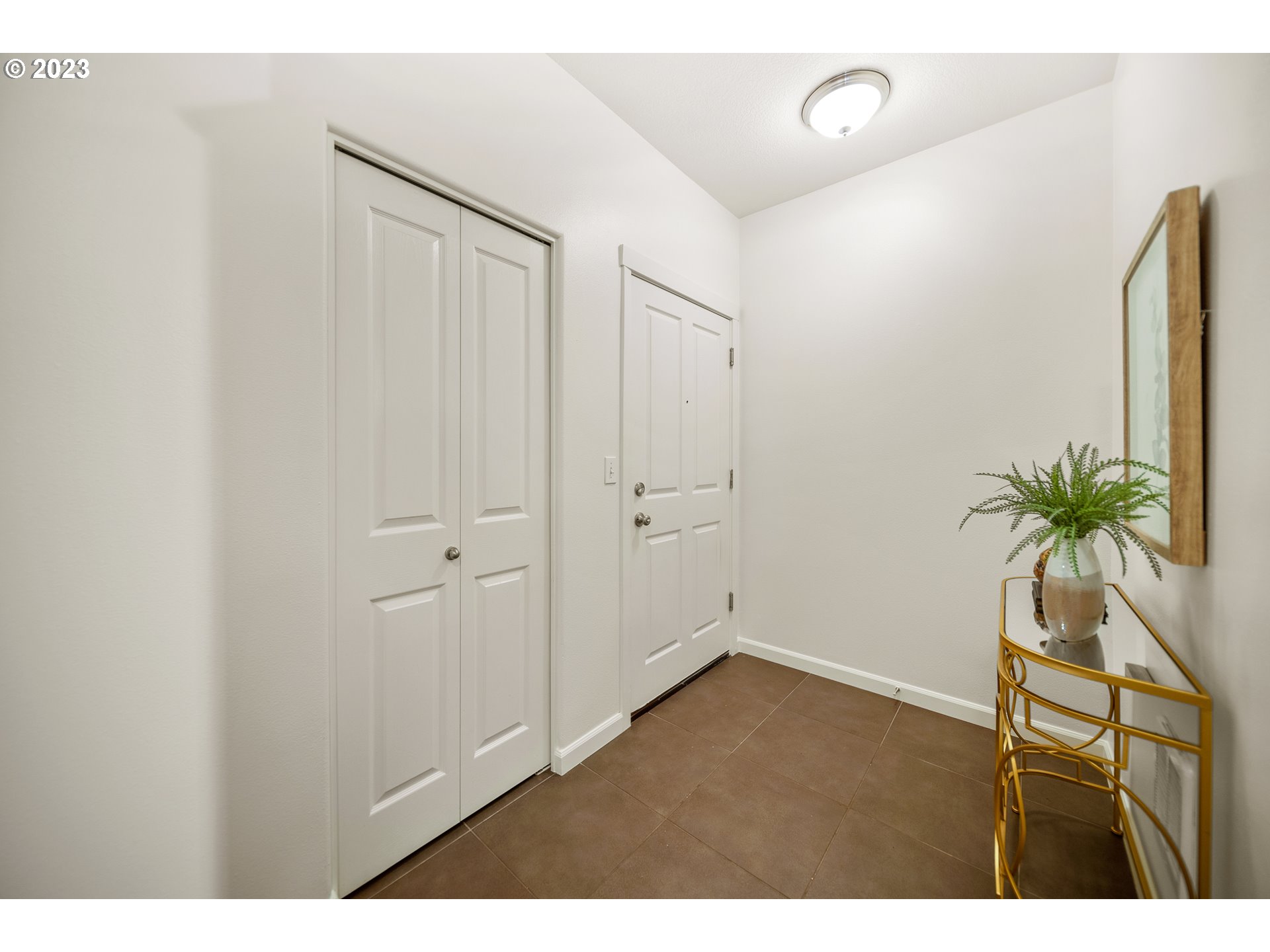 715 NW FALLING WATERS LN 102