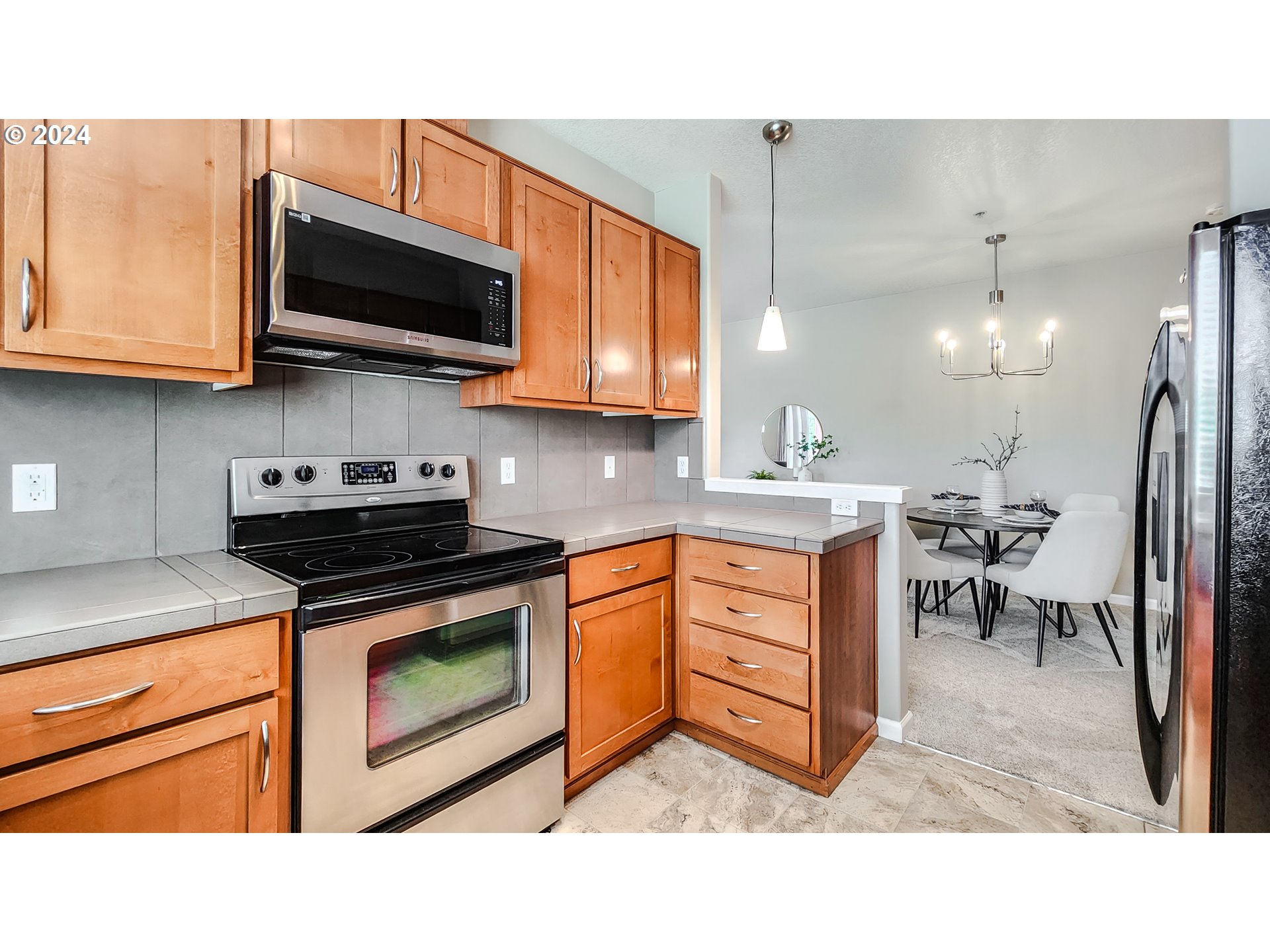 715 NW FALLING WATERS LN 303