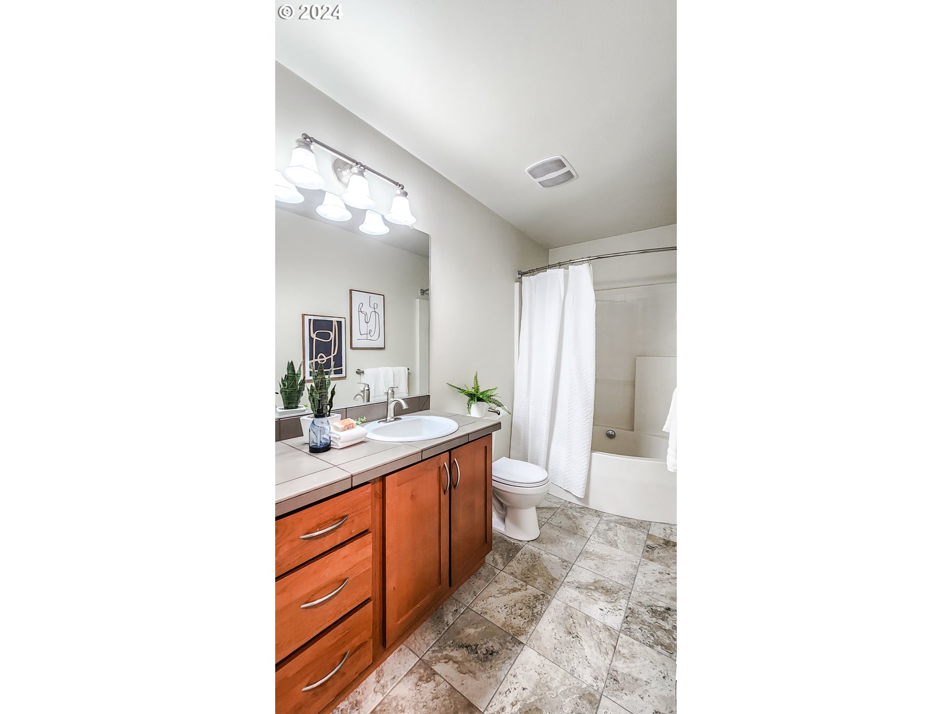 715 NW FALLING WATERS LN 303