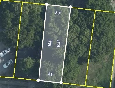 Aerial parcel map showing the outlined lot, neighboring boundaries, and dimensions of 31 by 104 feet.