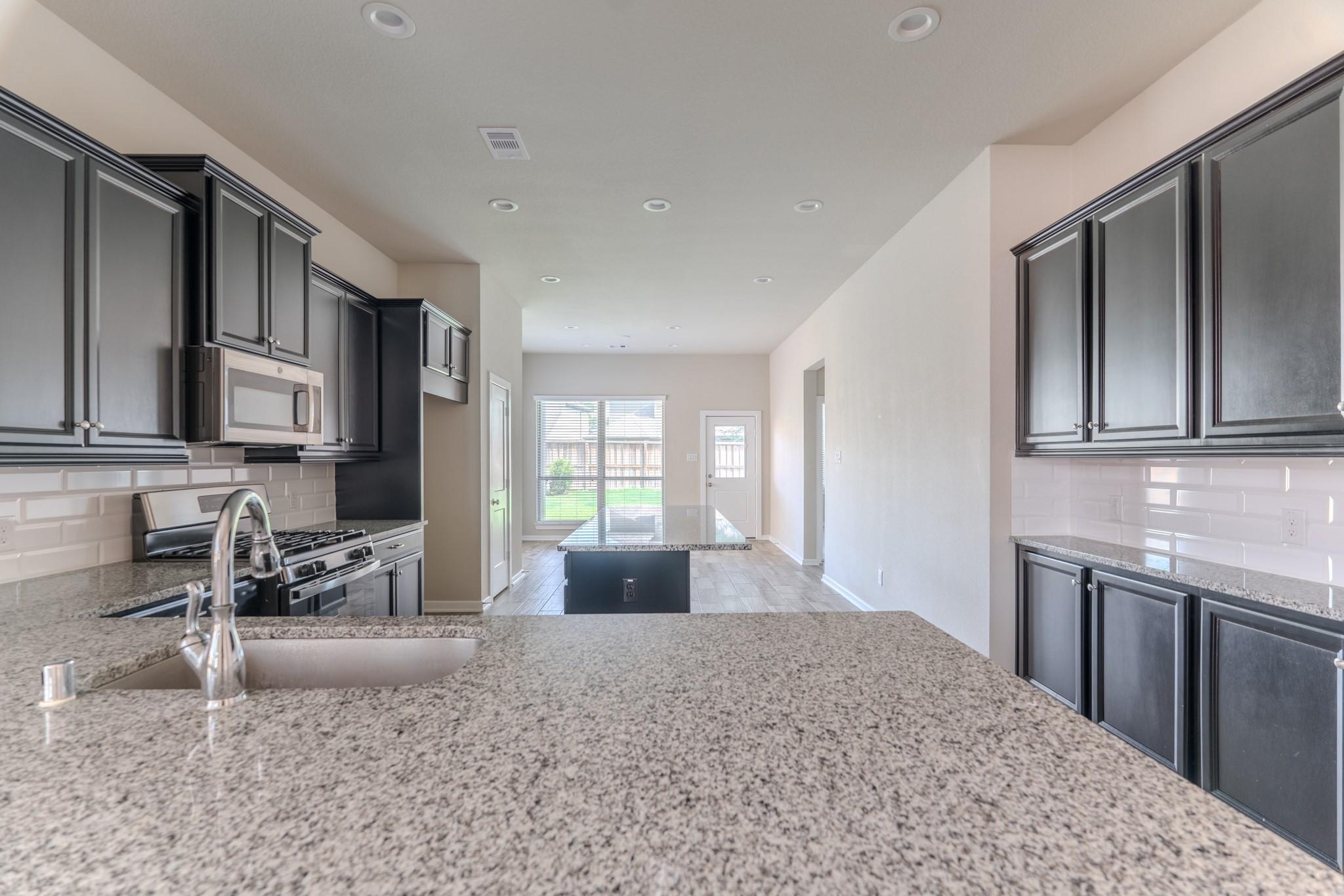 8026 Whisper Grove Drive