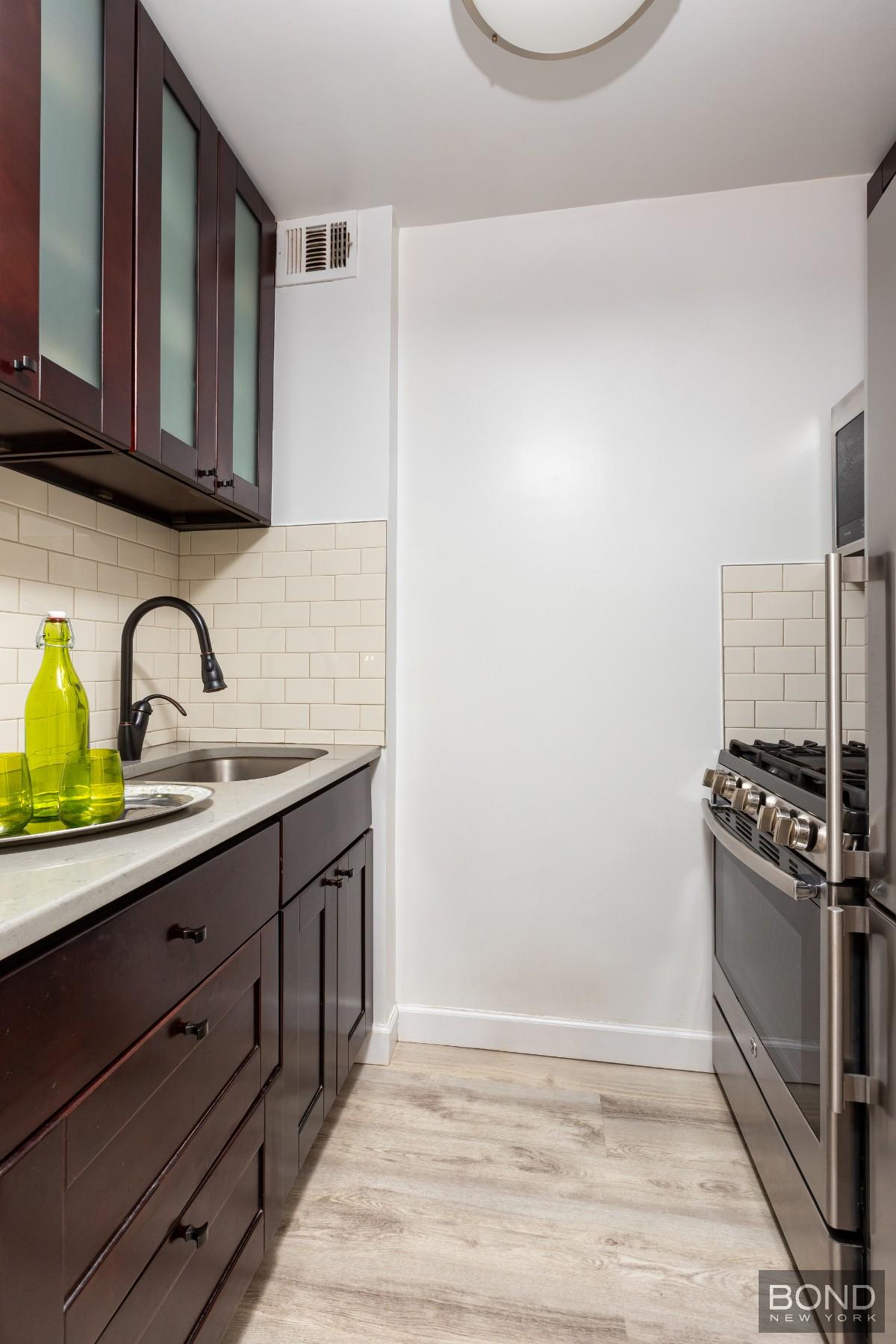 393 W 49th Street 3OO