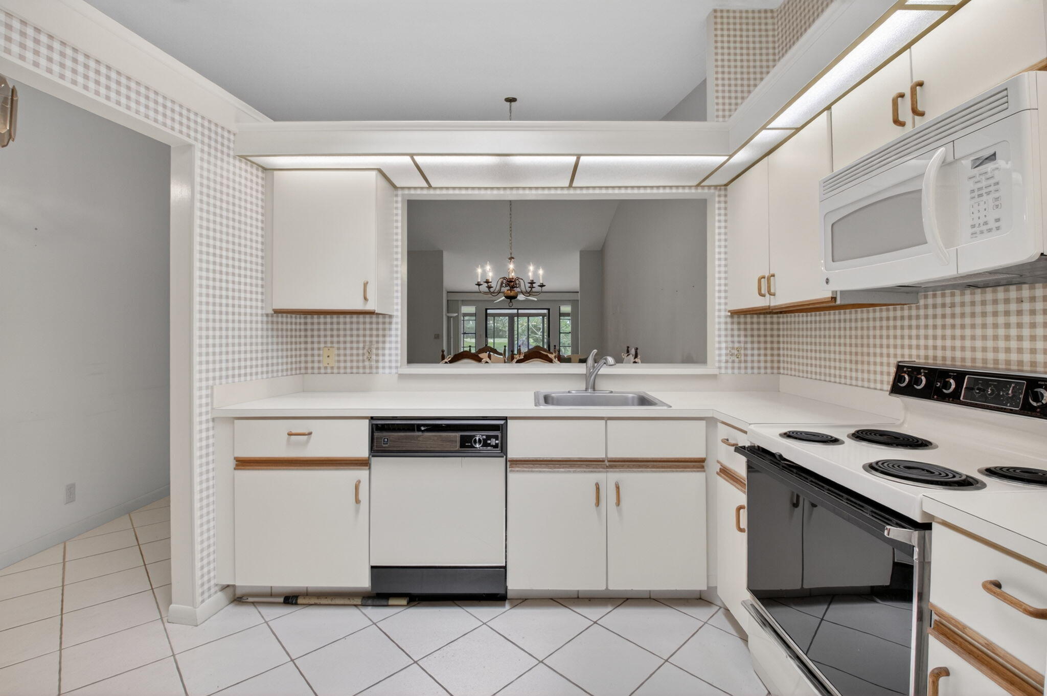 10939 Roebelini Palm Court A