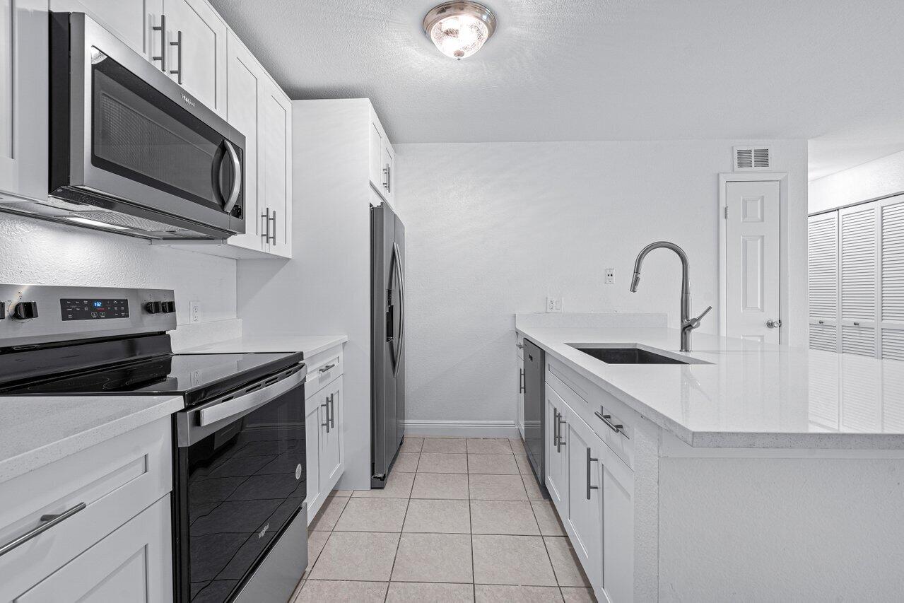 1865 Palm Cove Boulevard 9-207