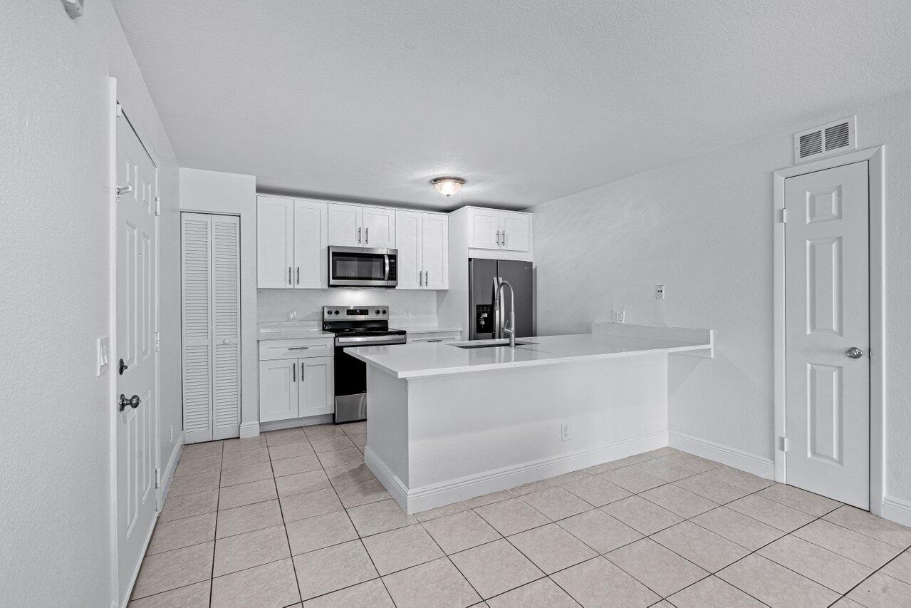 1865 Palm Cove Boulevard 9-207