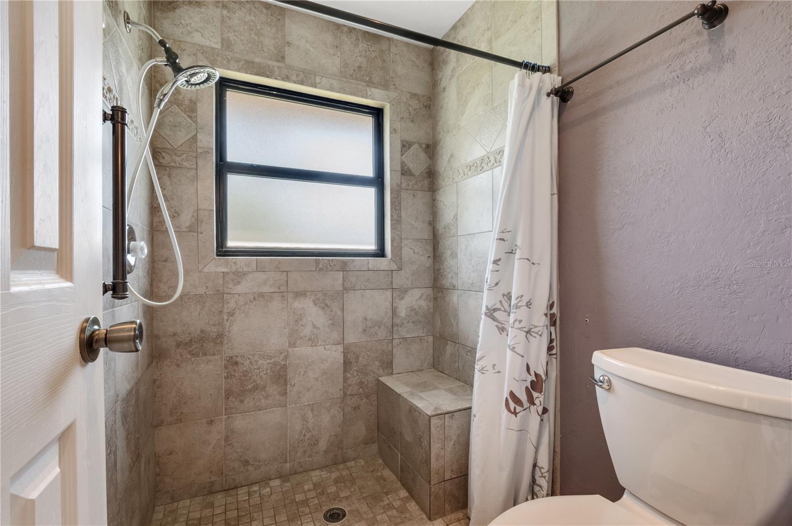 4809 BREEZY PALMS CT