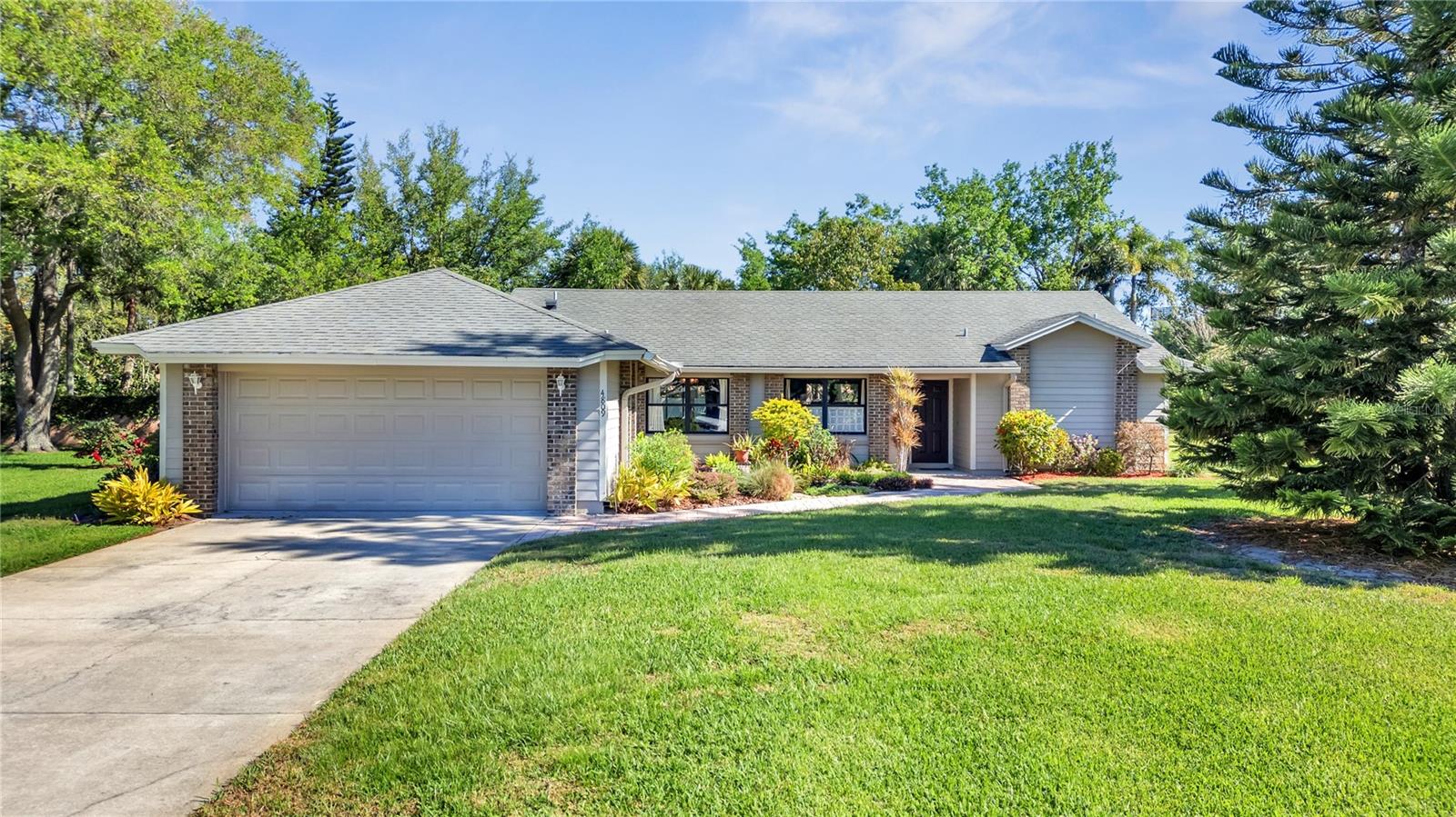 4809 BREEZY PALMS CT