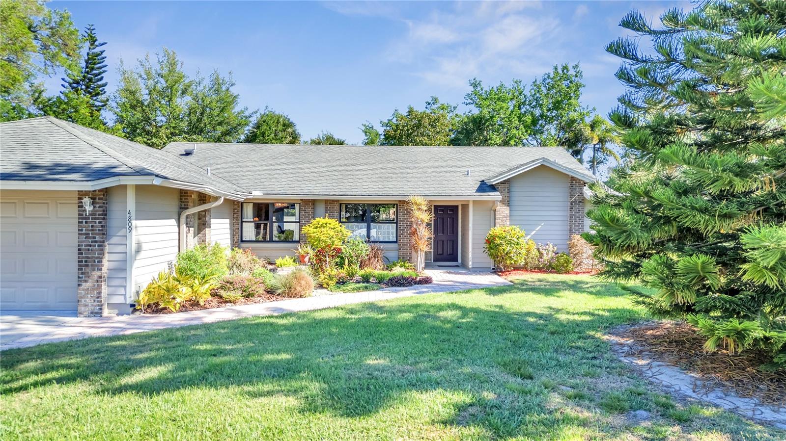 4809 BREEZY PALMS CT