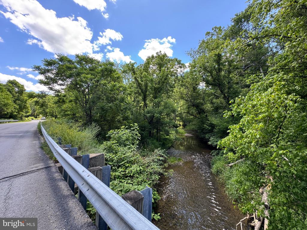 SAND MINE ROAD BY CREEK