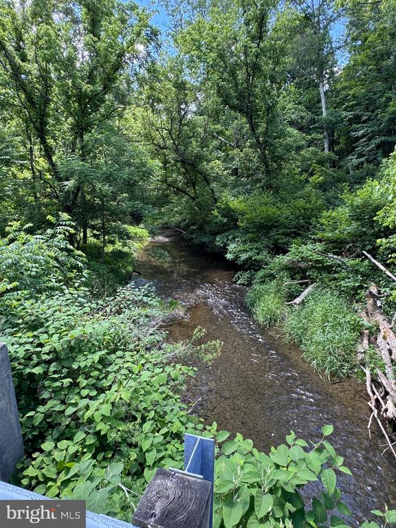 SAND MINE ROAD BY CREEK