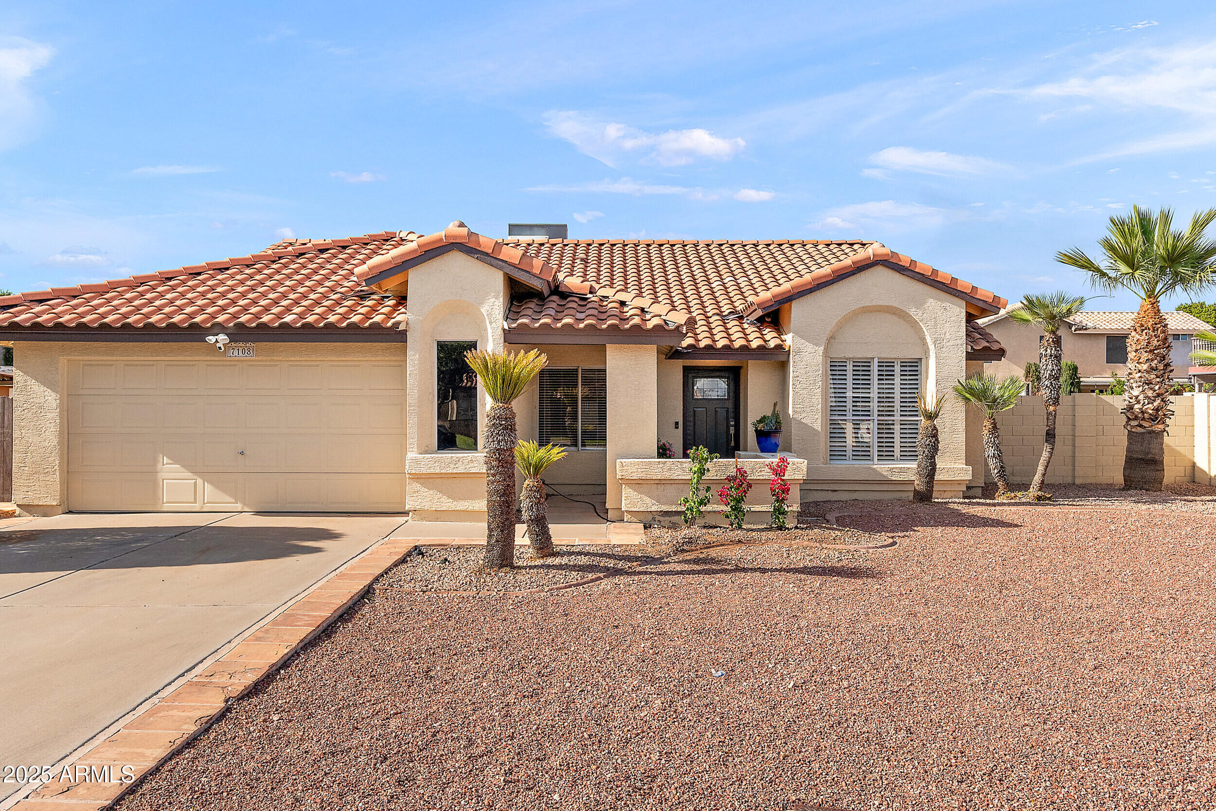 7108 W CORRINE Drive