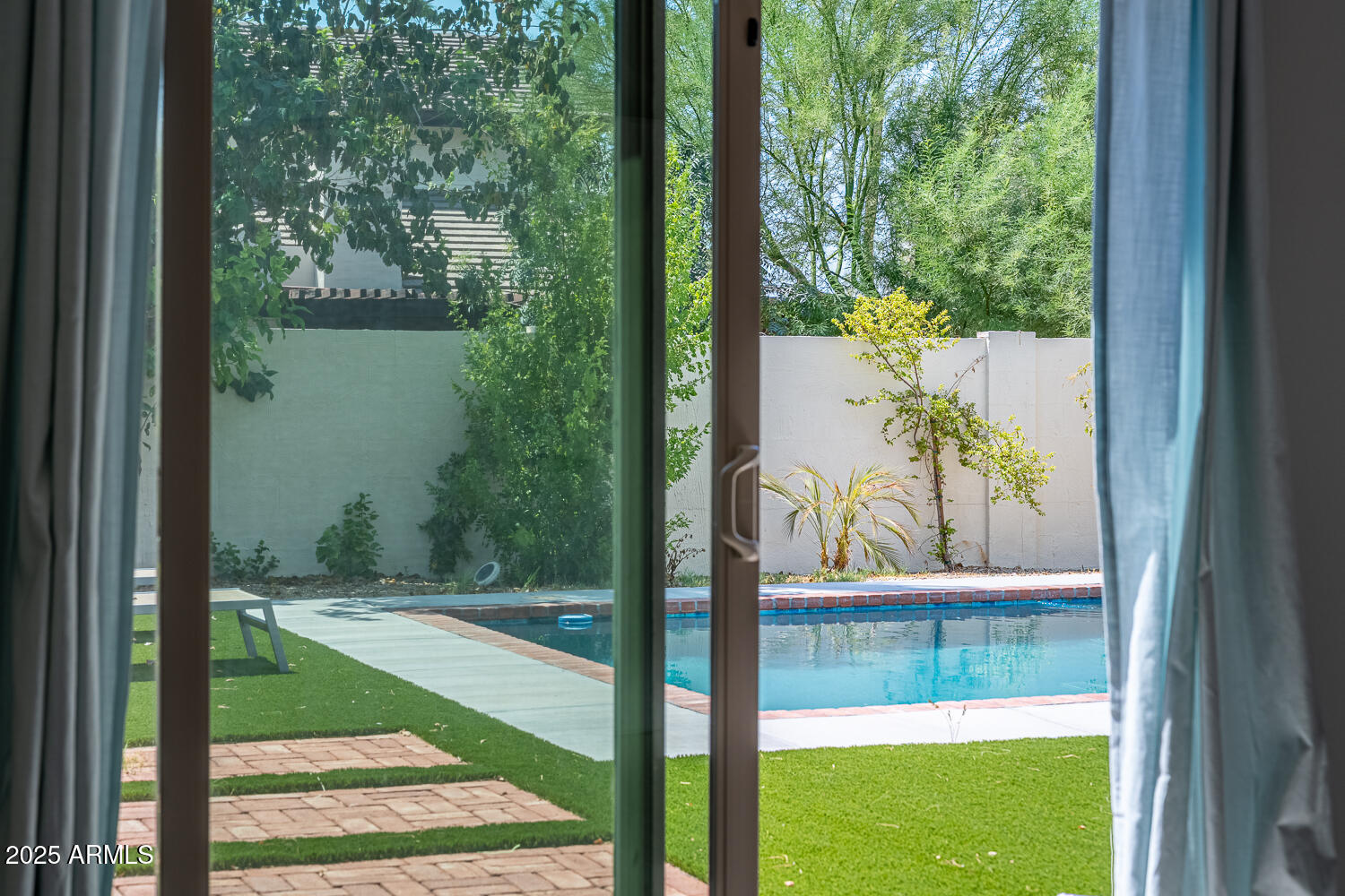 7701 E HUBBELL Street