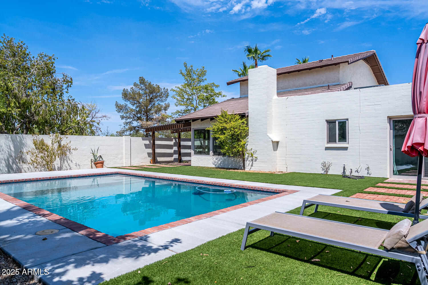 7701 E HUBBELL Street