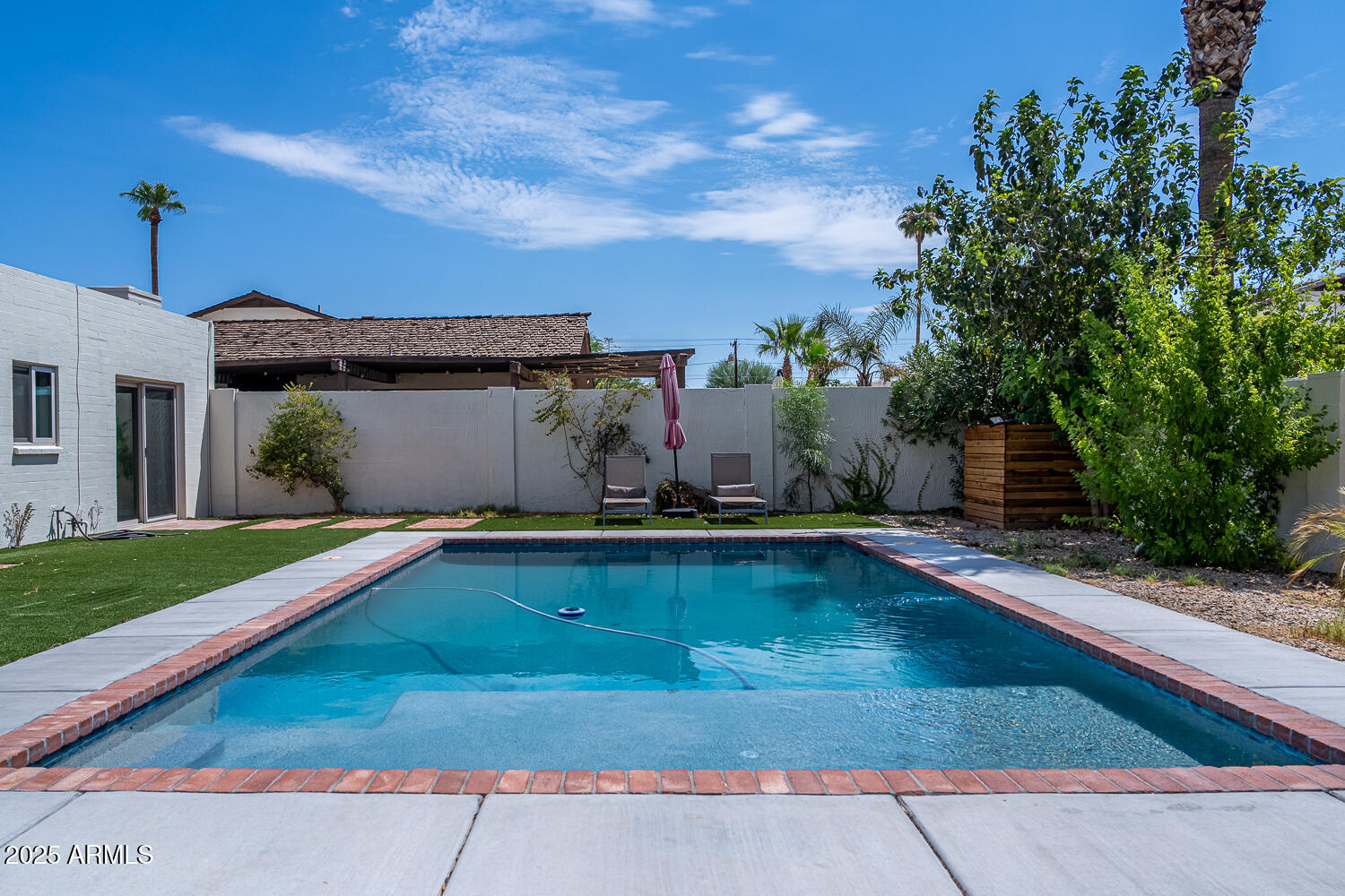 7701 E HUBBELL Street