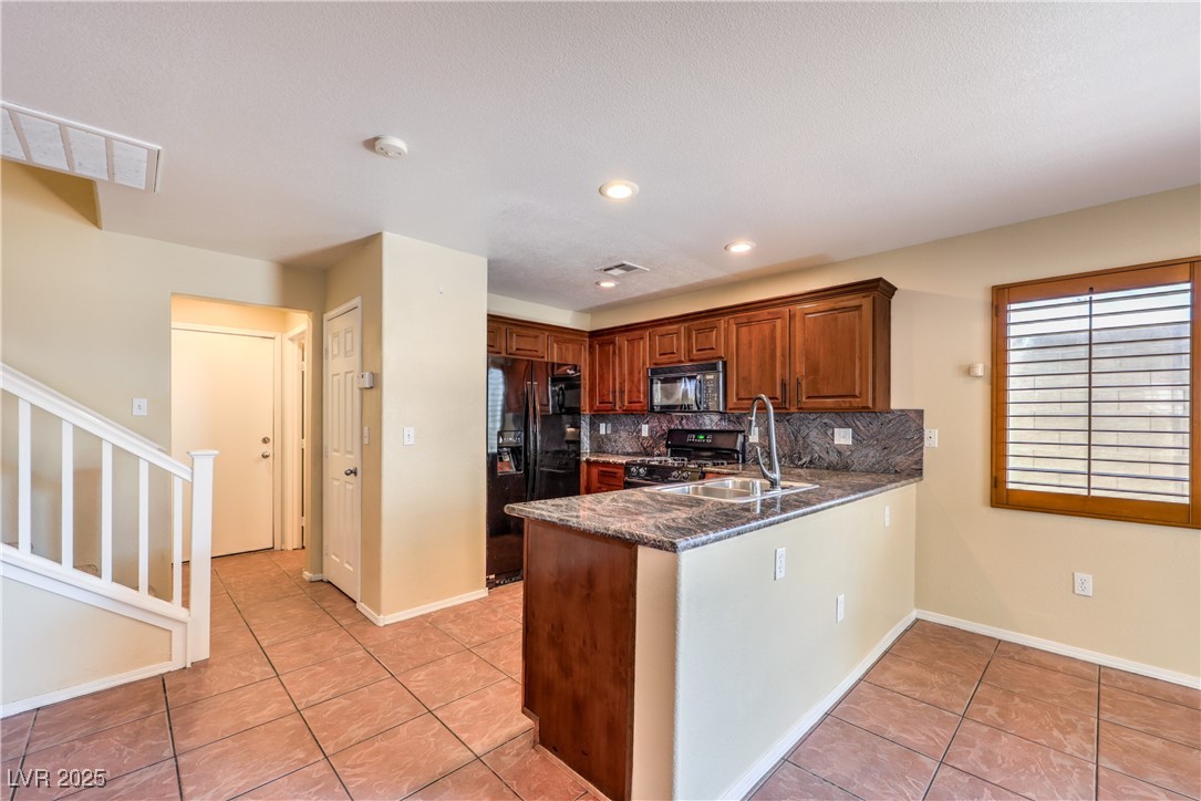 9073 Spoonbill Ridge Place