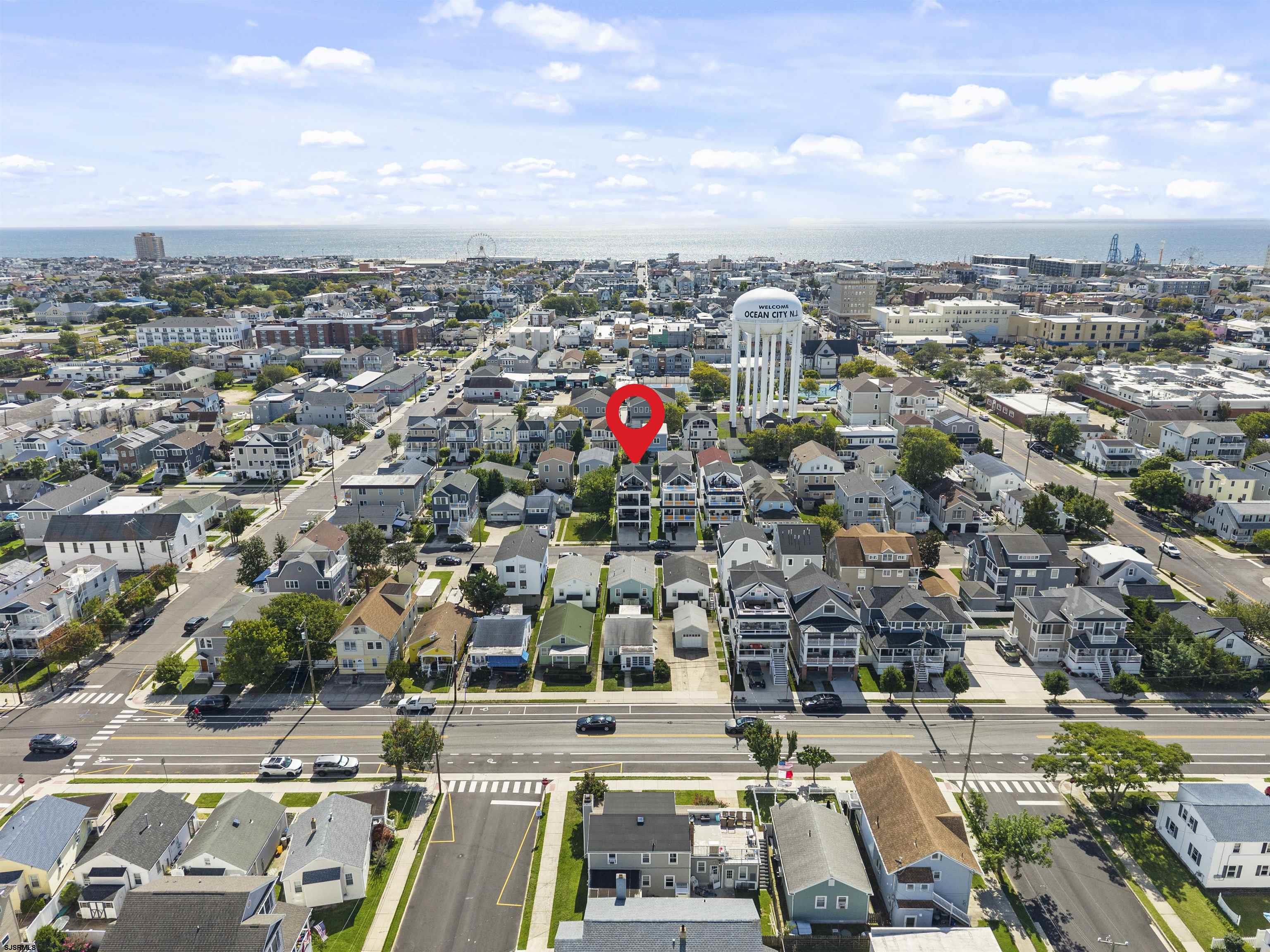 Aerial view of 725 Simpson in Ocean City, with the ocean and water tower beyond.