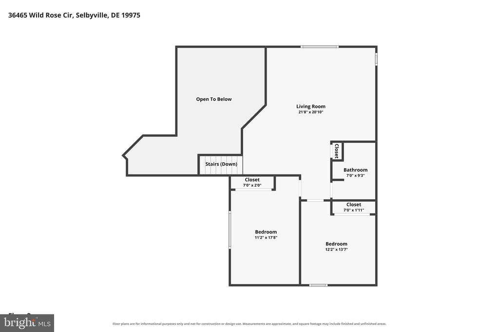 Second-floor plan with living room, two bedrooms, bathroom, stairs, closets, and an open-to-below area.