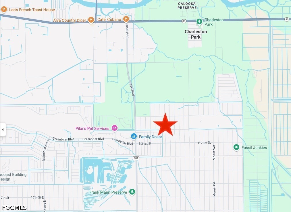 Map marking the property near E 21st Street and Greenbriar Boulevard with a red star.