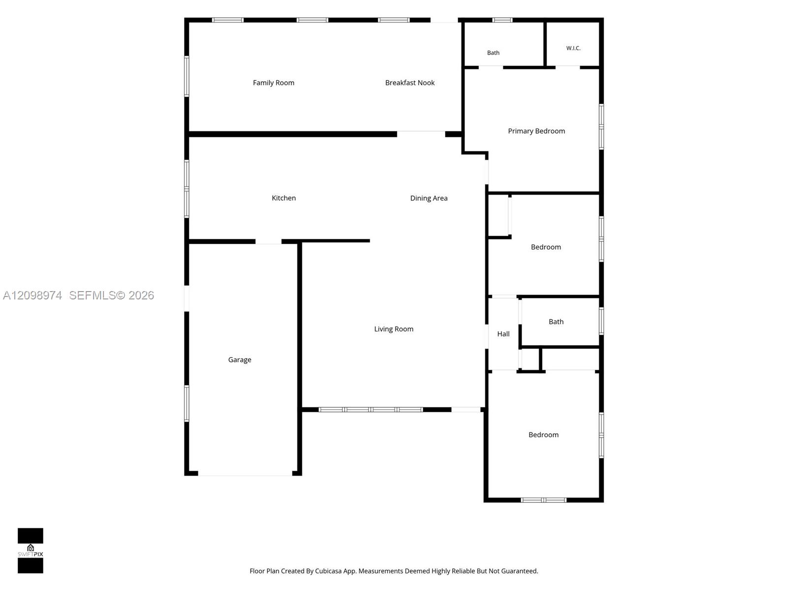 Floor plan showing the living areas, garage, primary suite, two bedrooms, and two bathrooms.
