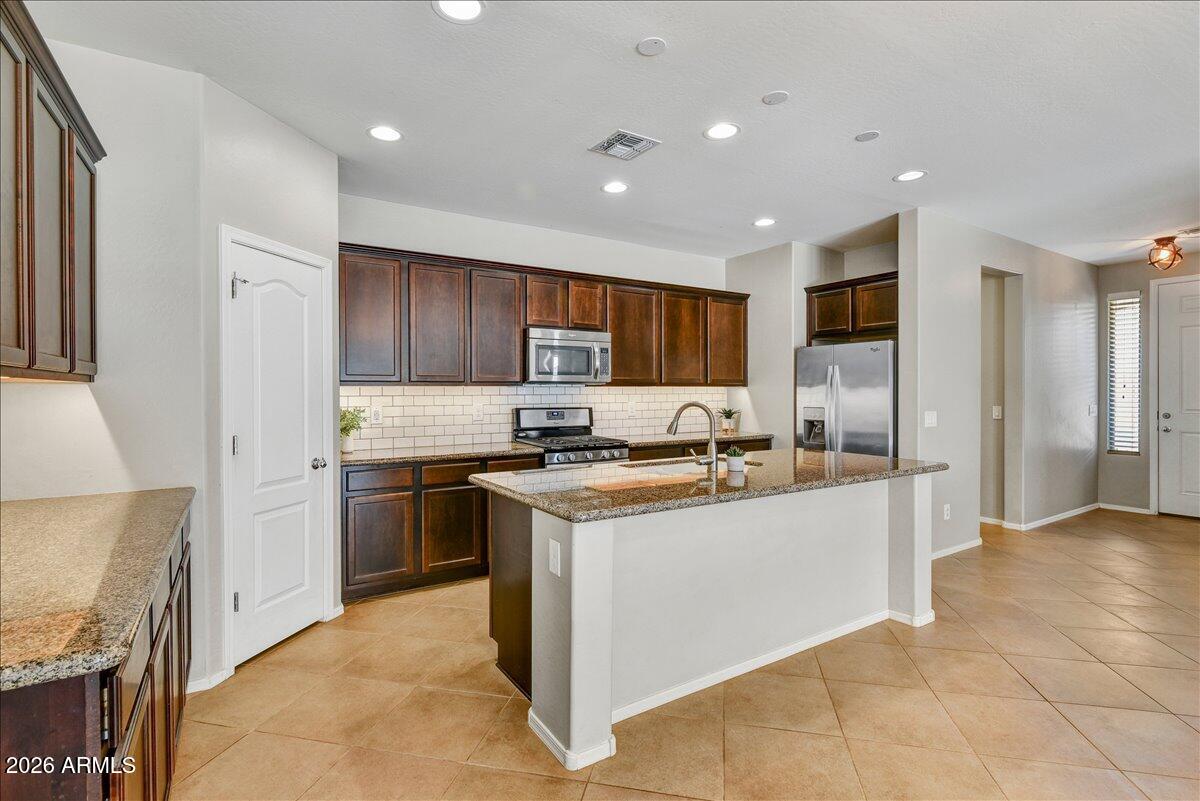 12026 W TETHER Trail