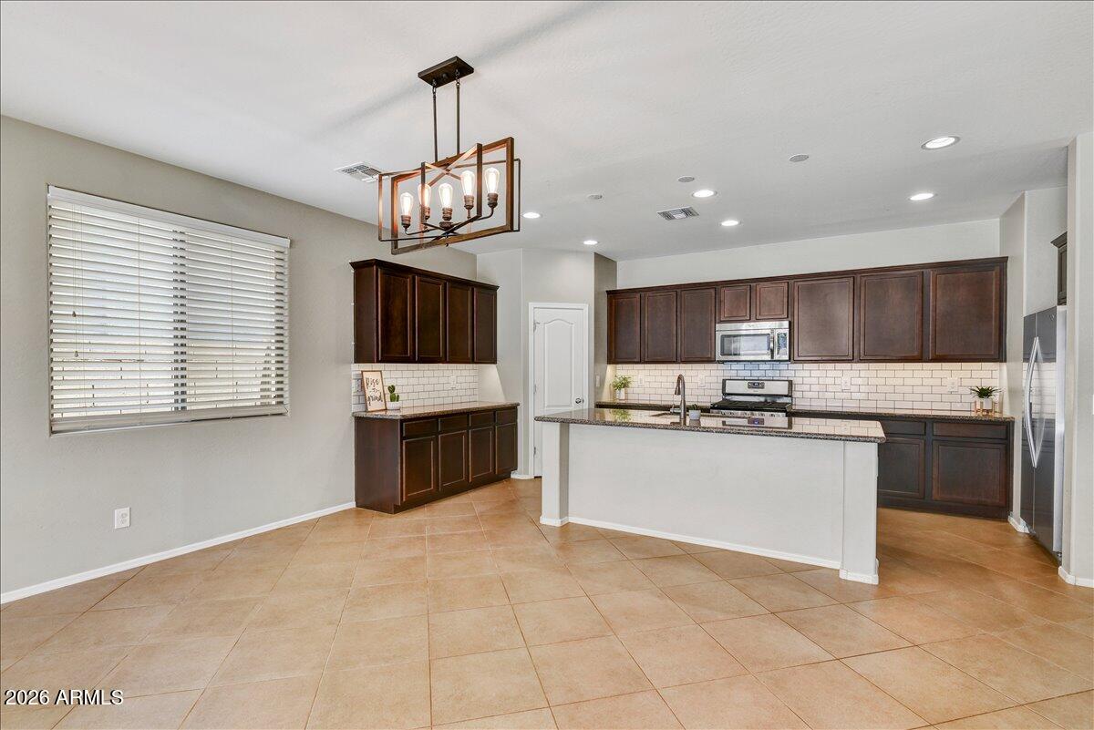 12026 W TETHER Trail