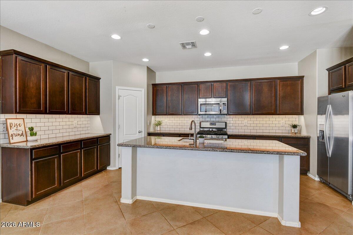 12026 W TETHER Trail