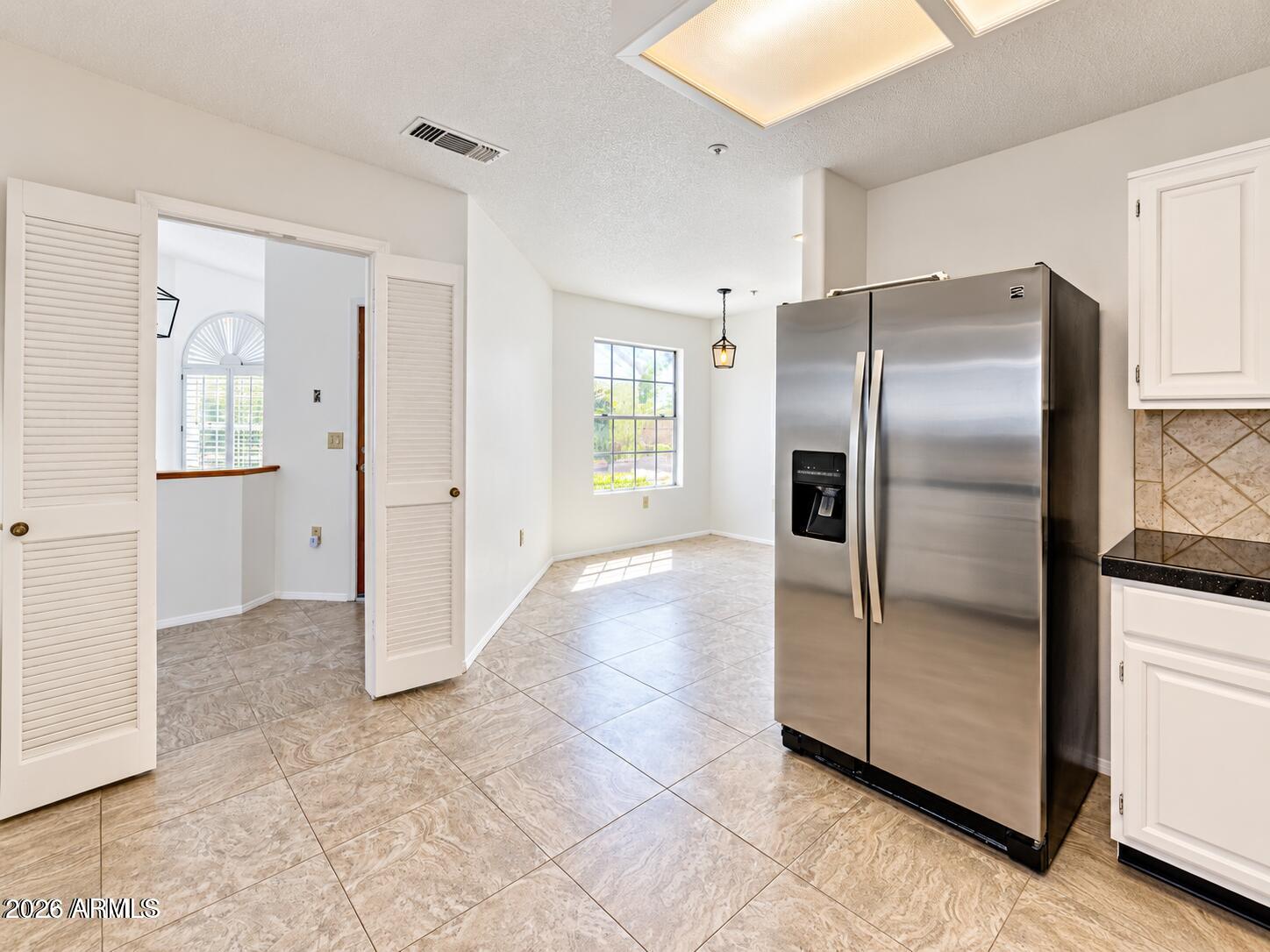 11218 E Mercer Lane