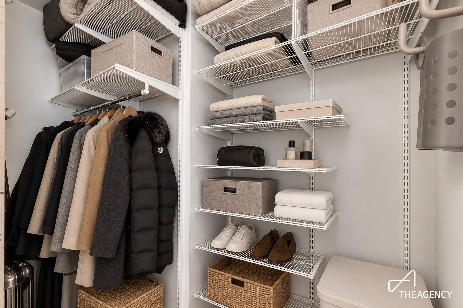 Organized walk-in closet with wire shelving, hanging coats, folded towels, and shoes.