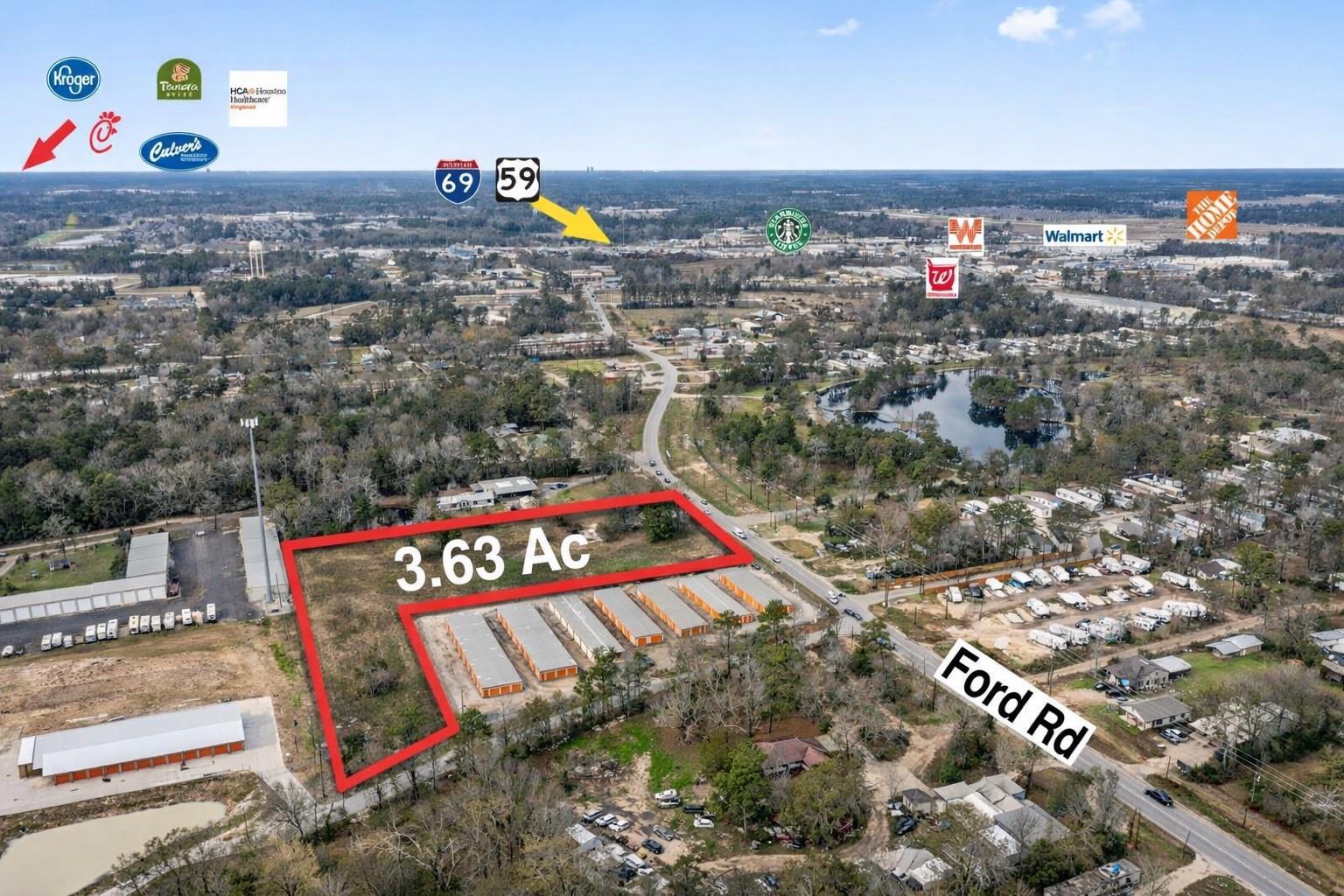 Aerial view of a 3.63-acre parcel outlined in red beside Ford Road.
