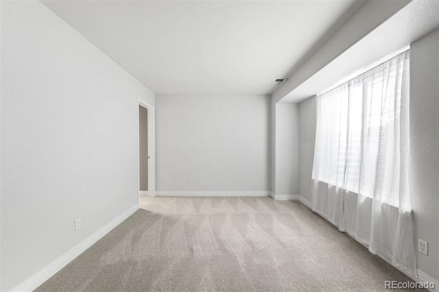 7303 E 8th Place