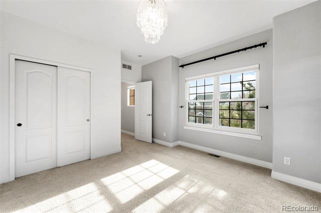 7303 E 8th Place