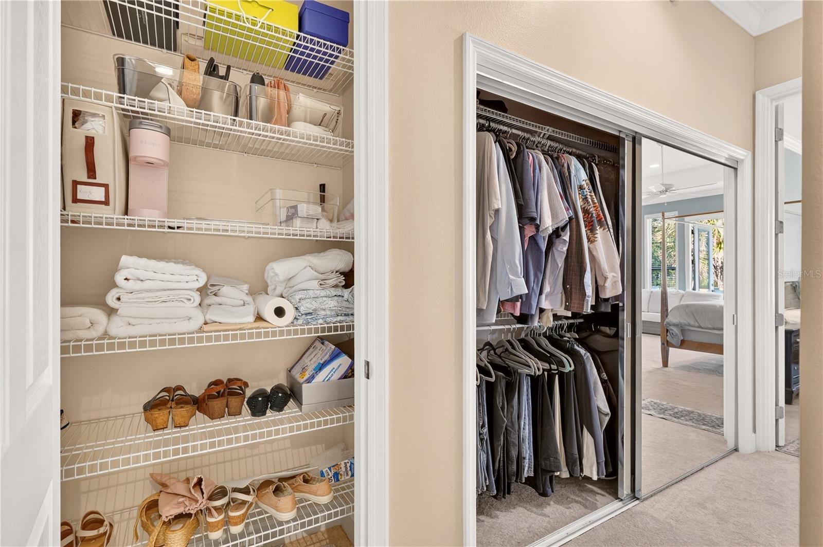 Bedroom closets with organized wire shelves, folded towels, shoes, and mirrored doors.