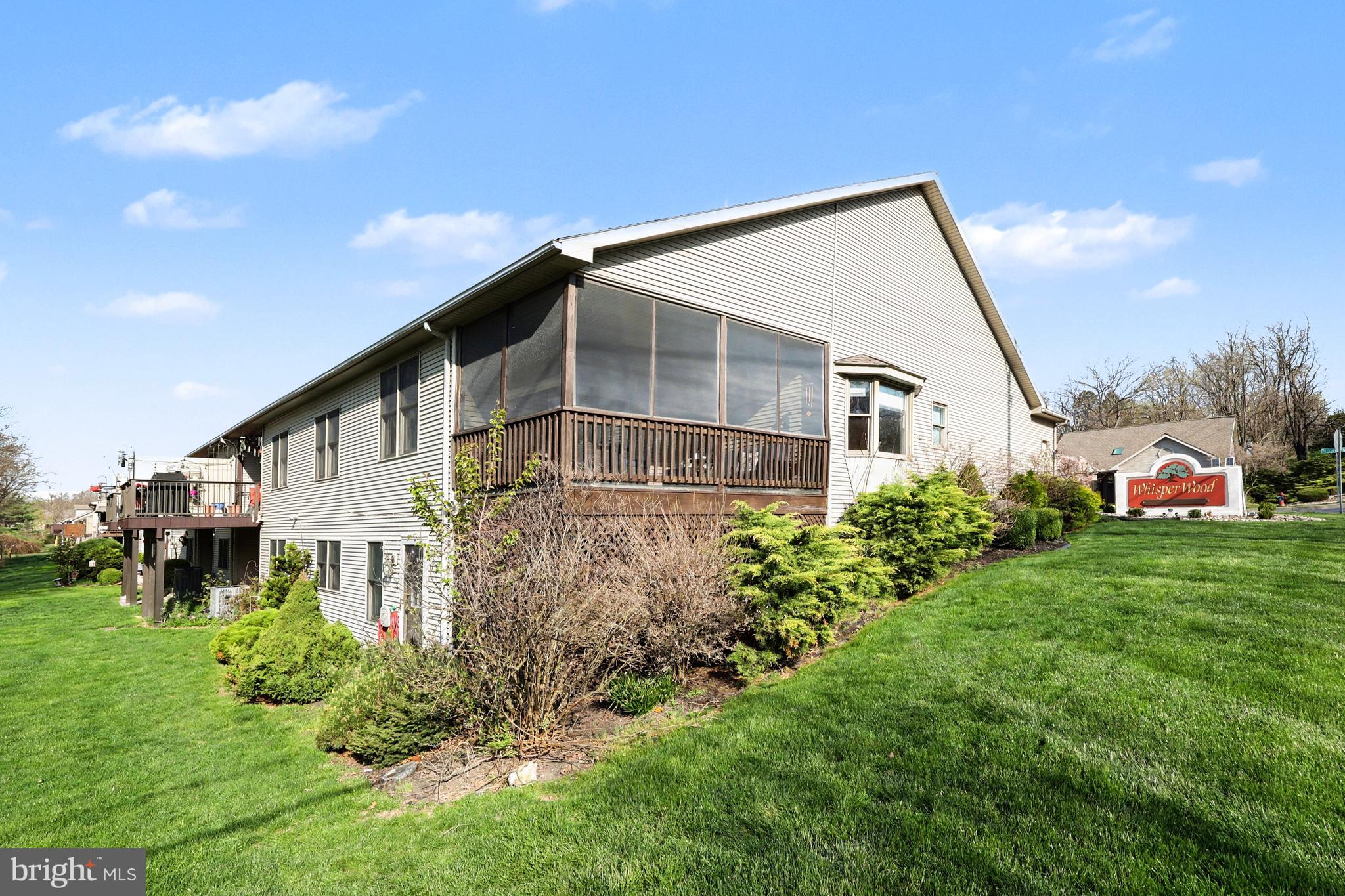 6401 WHISPER WOOD LANE