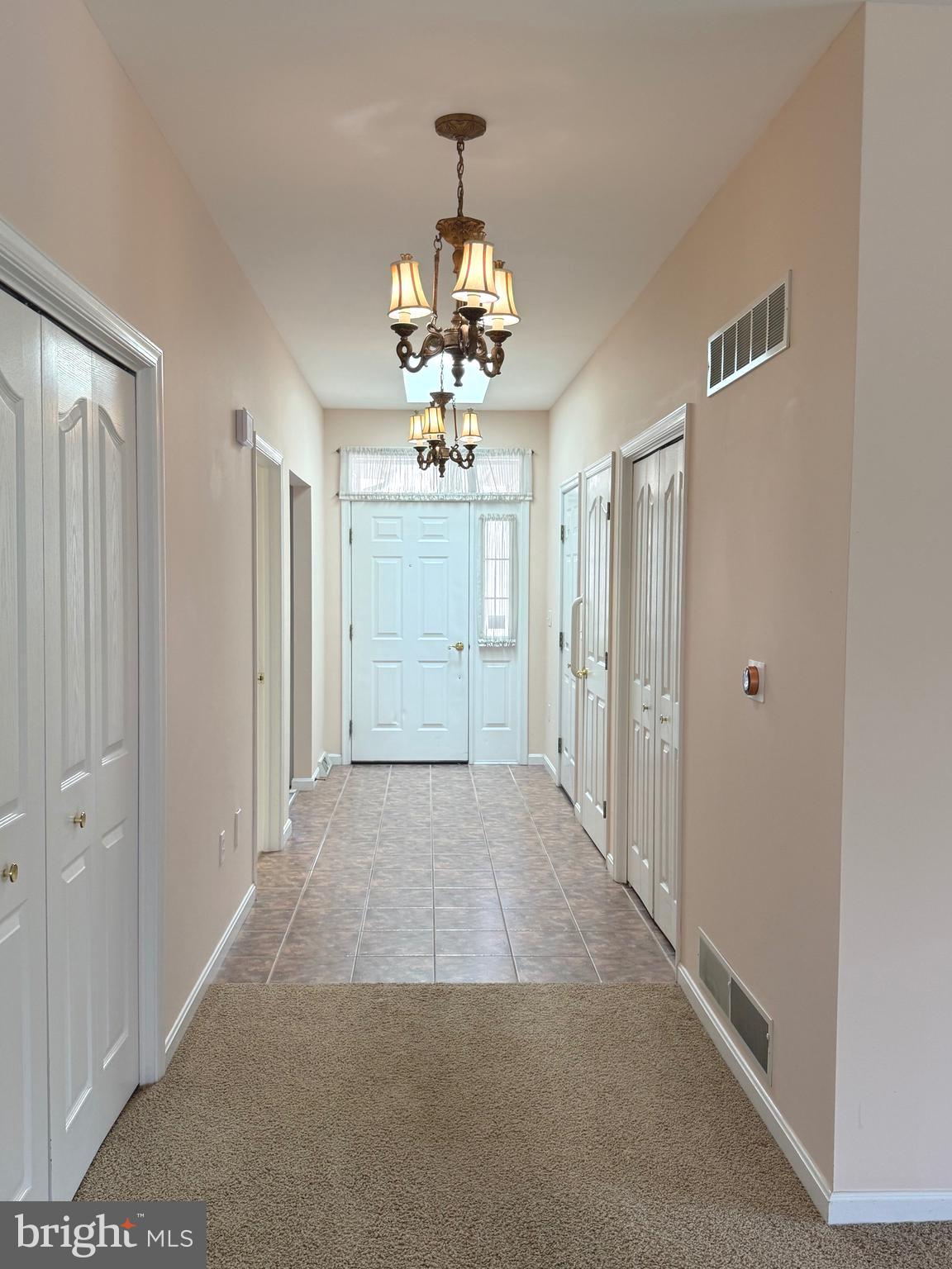 6401 WHISPER WOOD LANE