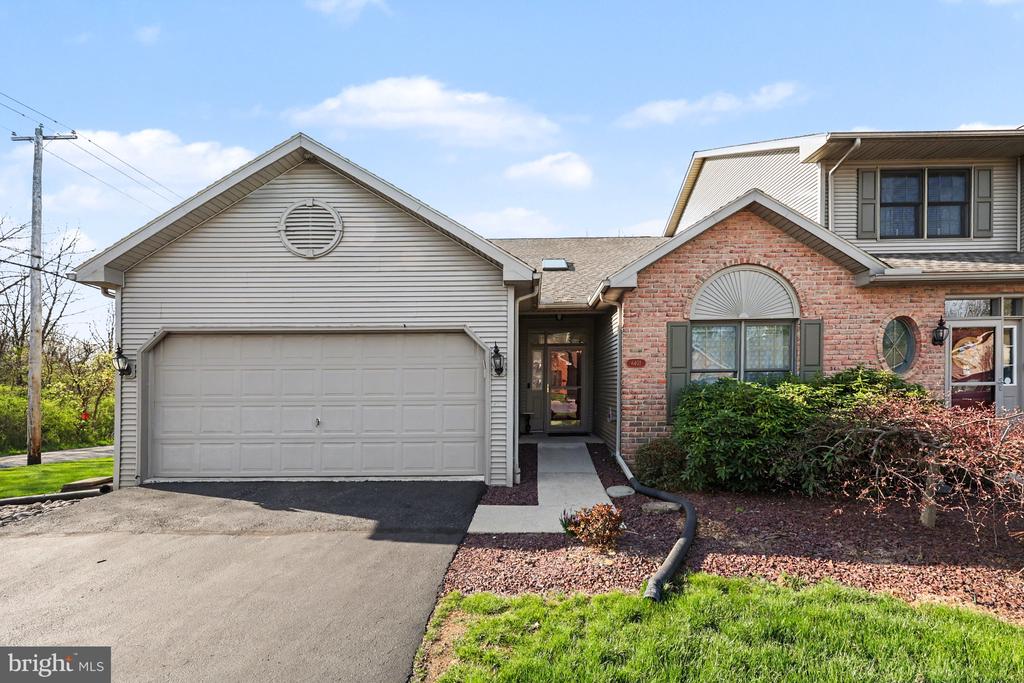 6401 WHISPER WOOD LANE